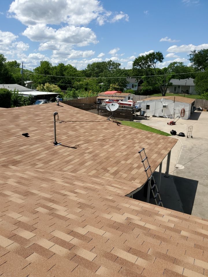 Residential Roofing Installation using Roofing Shingles by Harvey Roofing & Construction