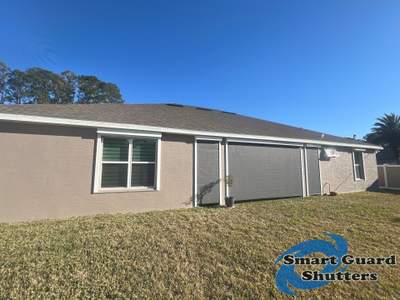 UltraShield Hurricane Screen, Bahamas Shutters in Signal White, Rolling Shutters in White
