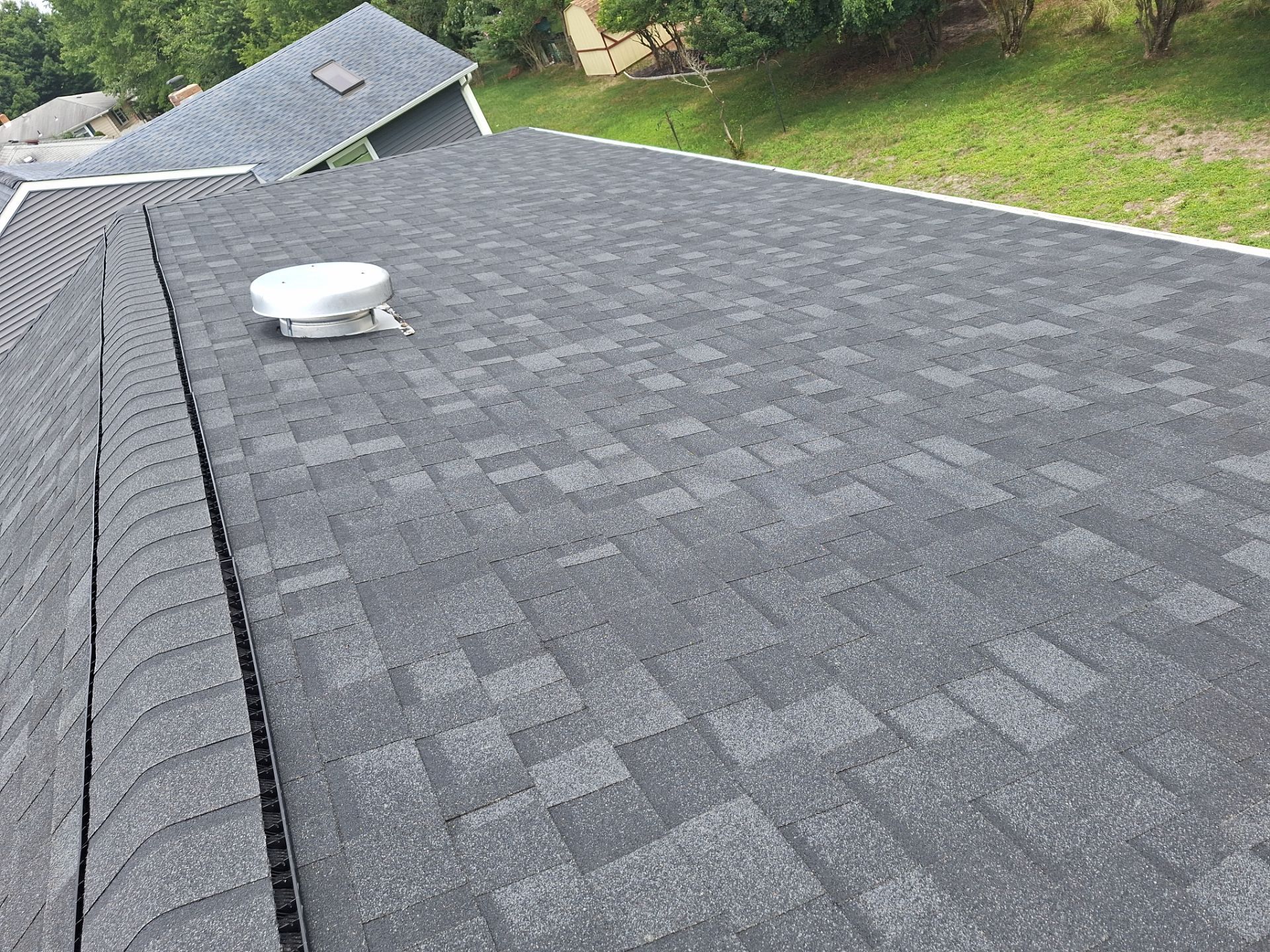 Estate Gray Shingles by Reimagine Roofing