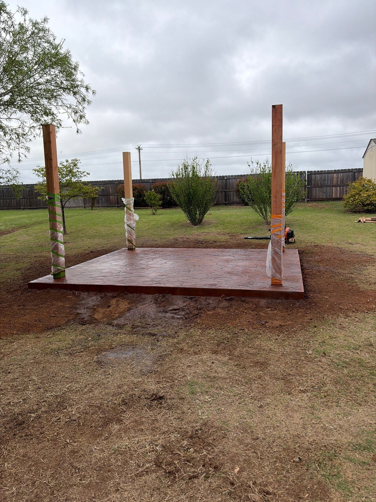 Stamped Concrete & Custom Pergola Build by Clays Services Inc