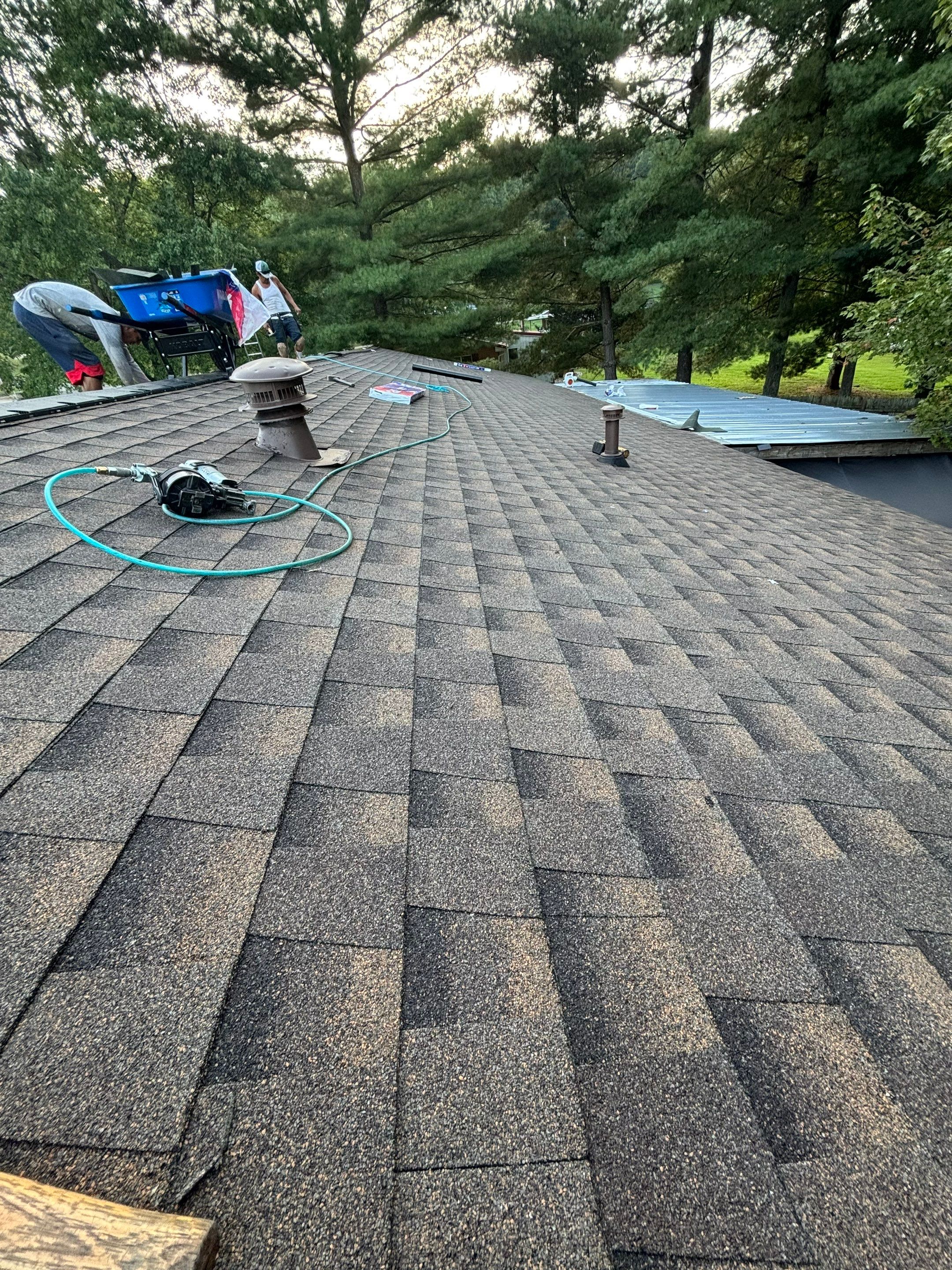 Residential Roofing Installation using GAF Timberline HDZ Charcoal by Rainstoppers Roofing