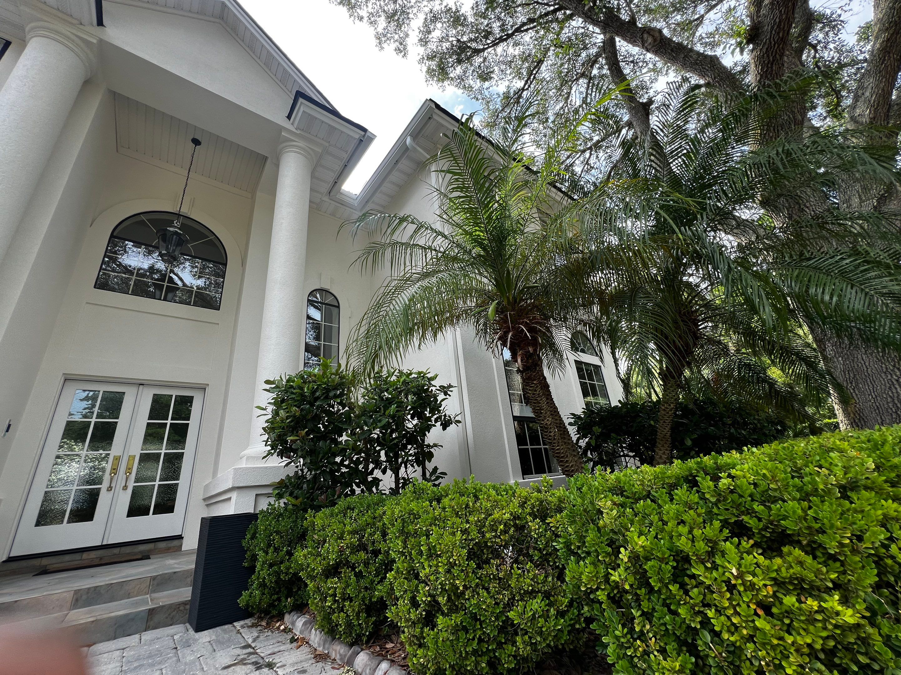 Large Stucco Home Exterior Painting in Marsh Landing | Ponte Vedra Beach, FL by A New Leaf Painting, LLC