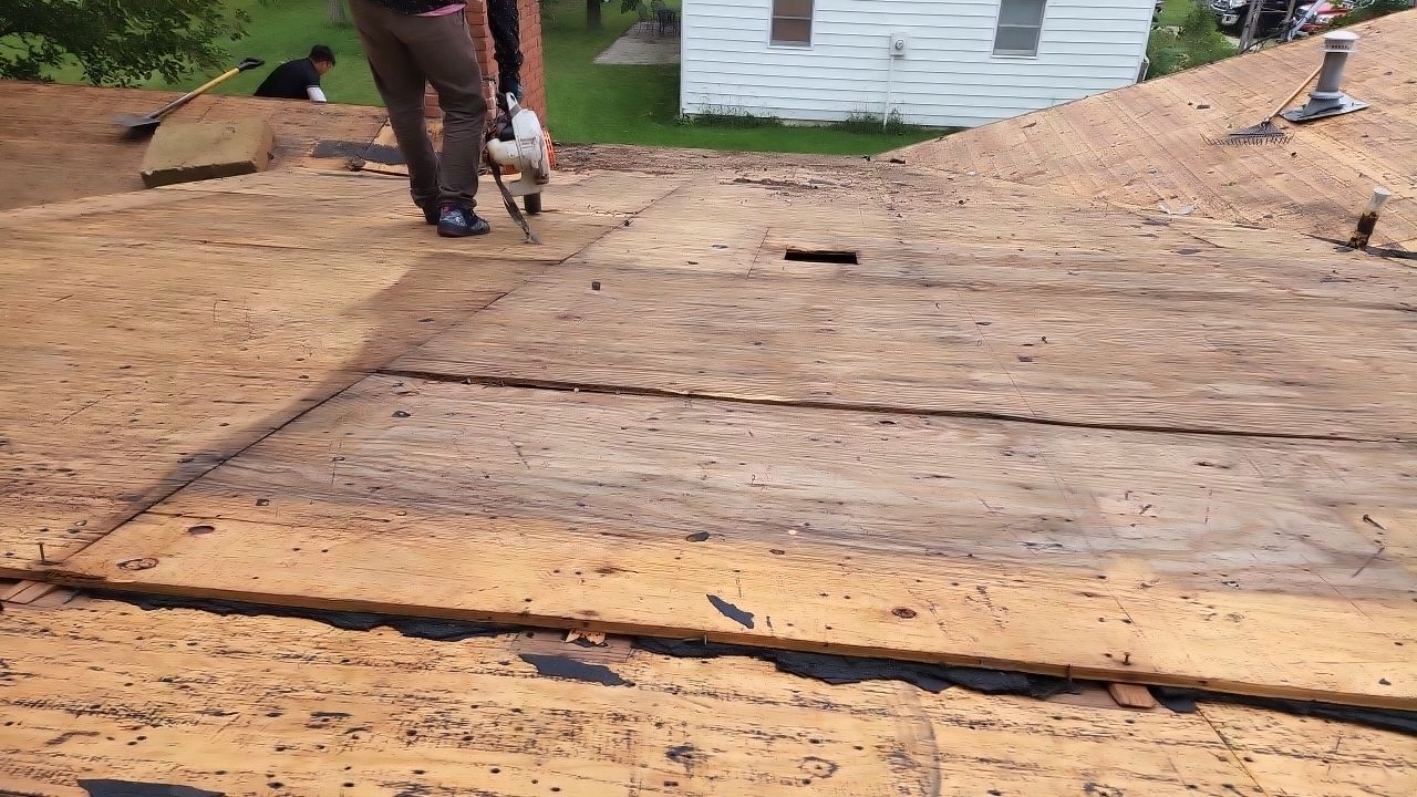 Residential Roofing Installation using 60 mil rubber roof  by Nitro Roofing and Construction