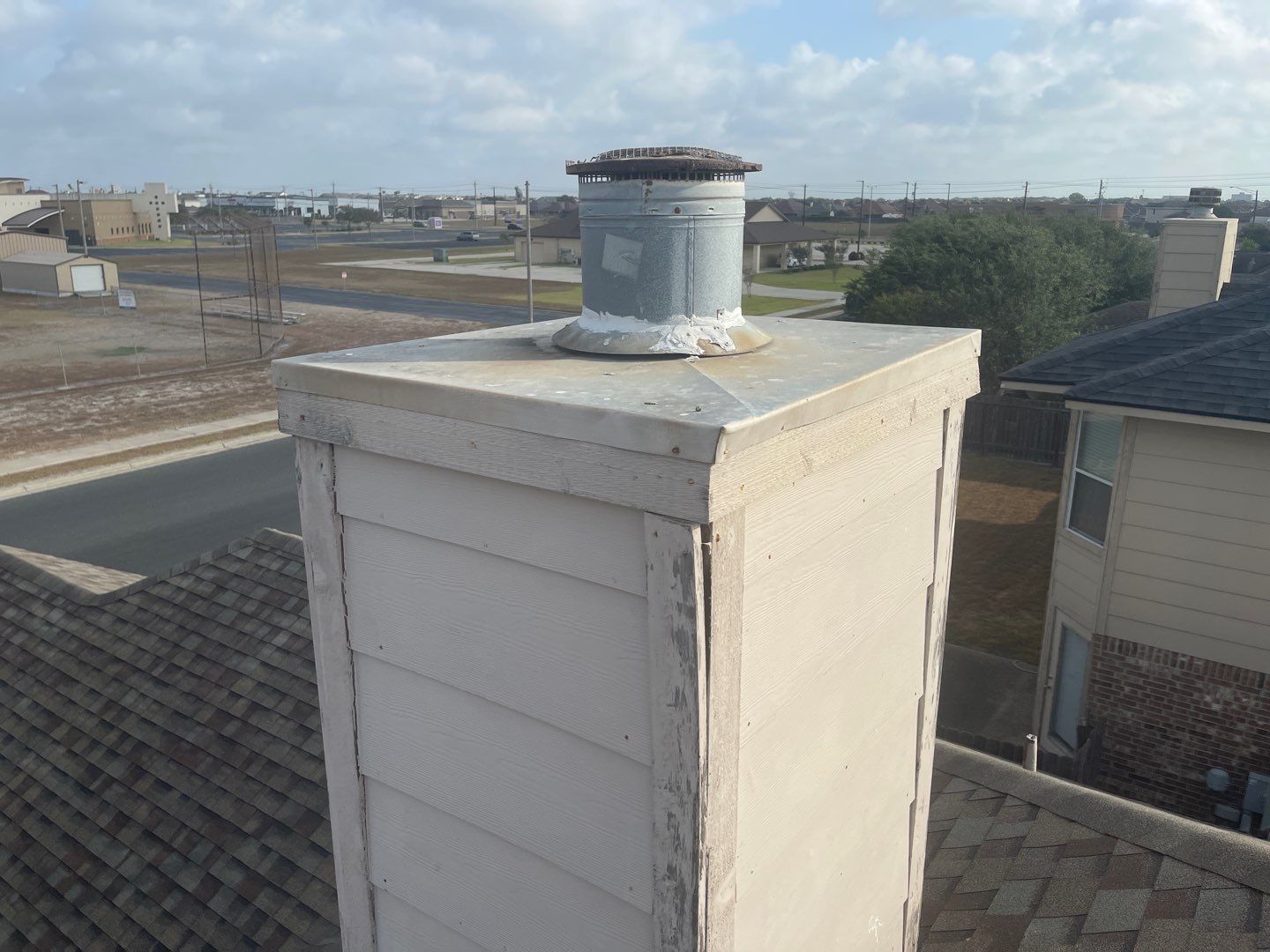 Chimney Cap Replacement using Custom Fabricated Steel by Lighthouse Roofing