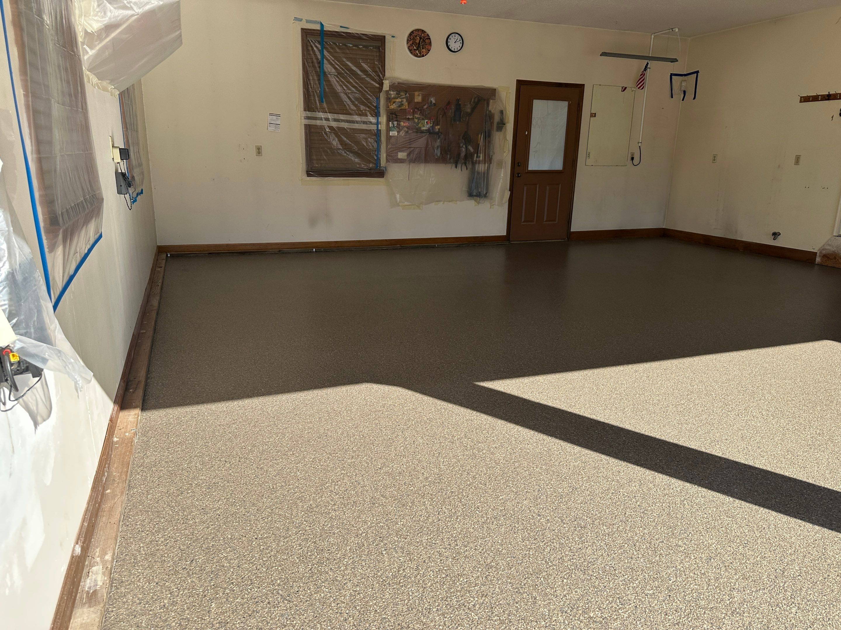 Driveway using Obsidian by Elite Floor Solutions