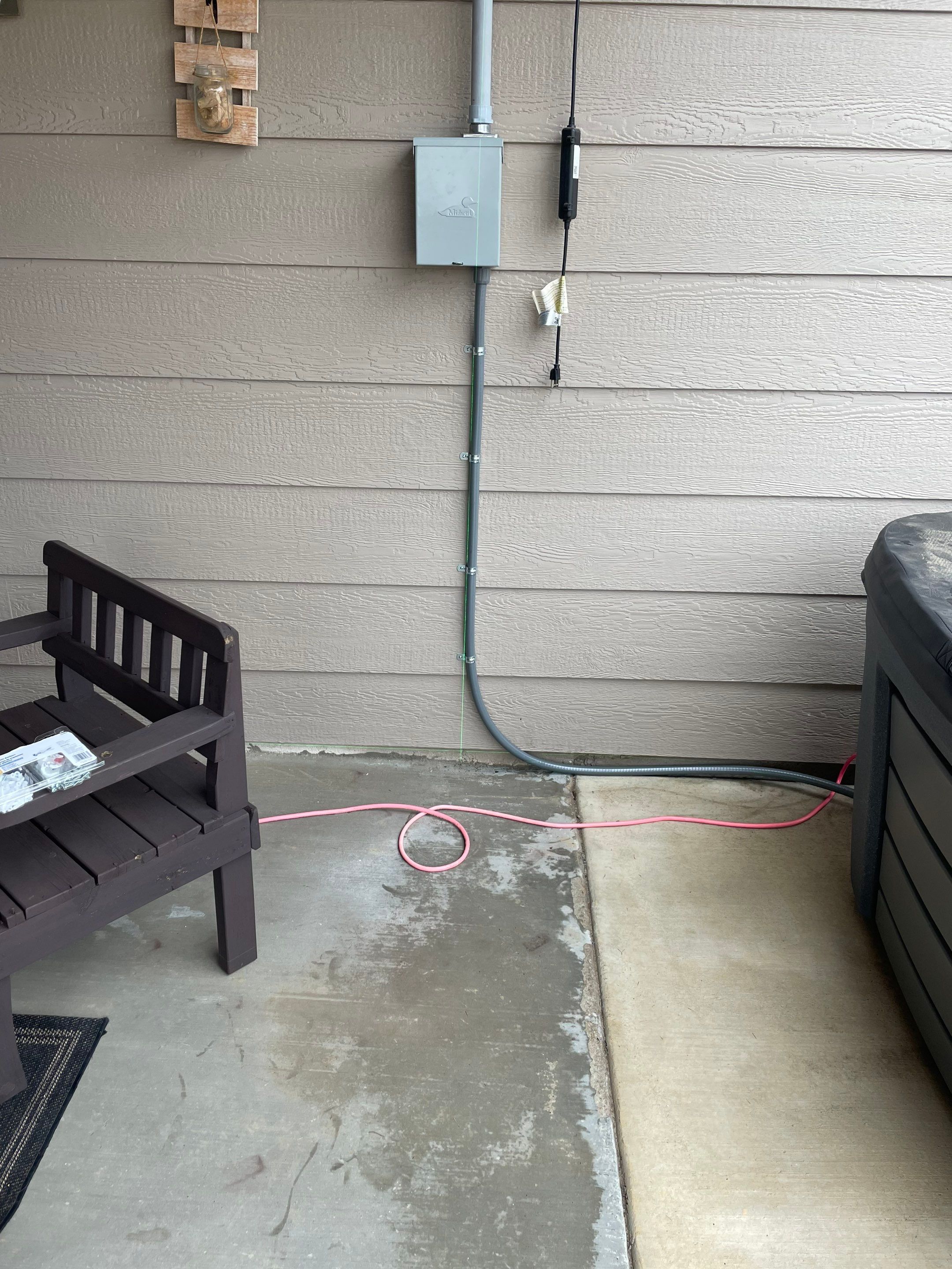 Tesla Wall Connector. Can lights. Spa disconnect. Exterior Outlets.  by Get Stoked Renovations