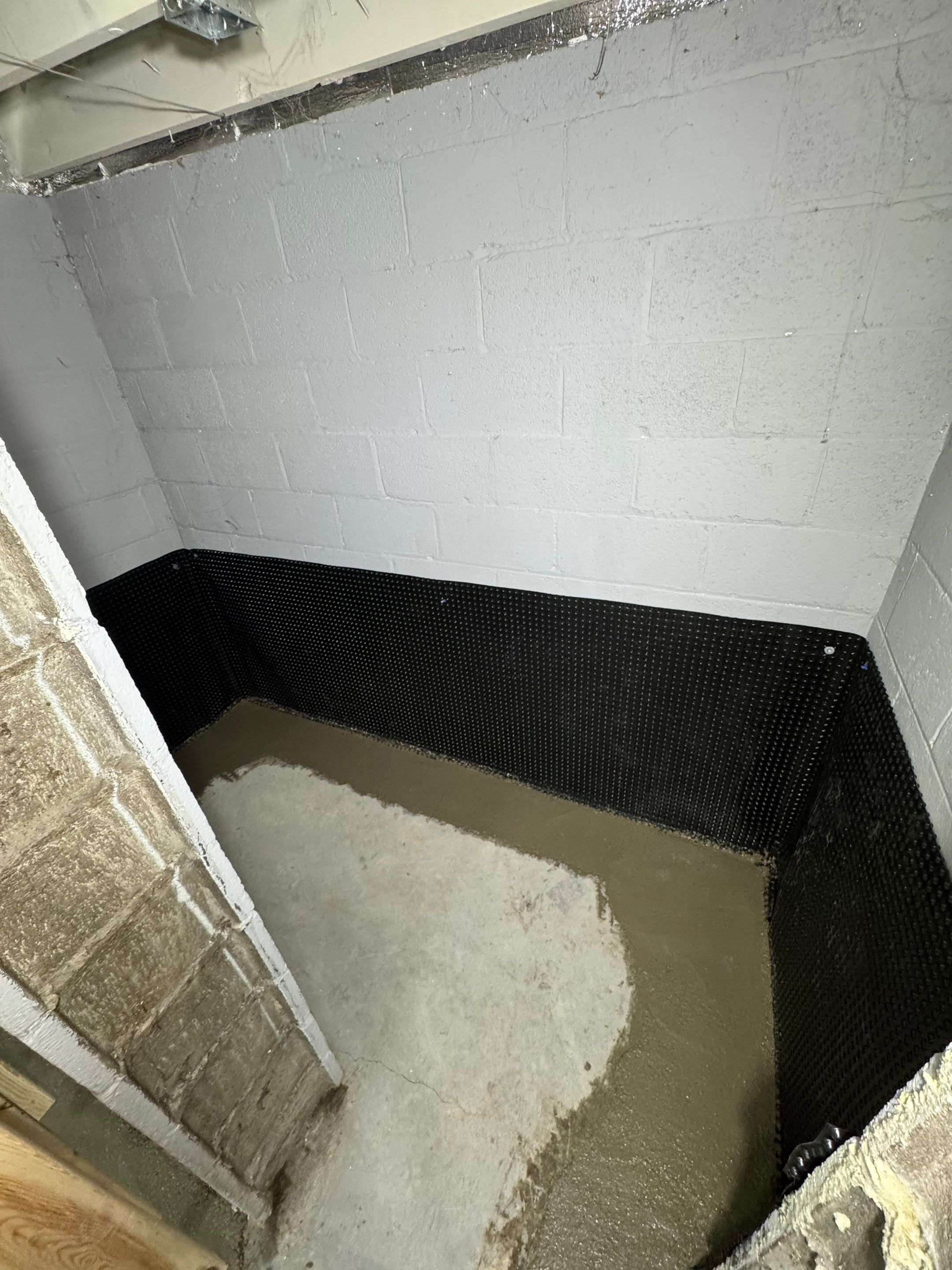 Basement Drain Tile by Area Wide Waterproofing