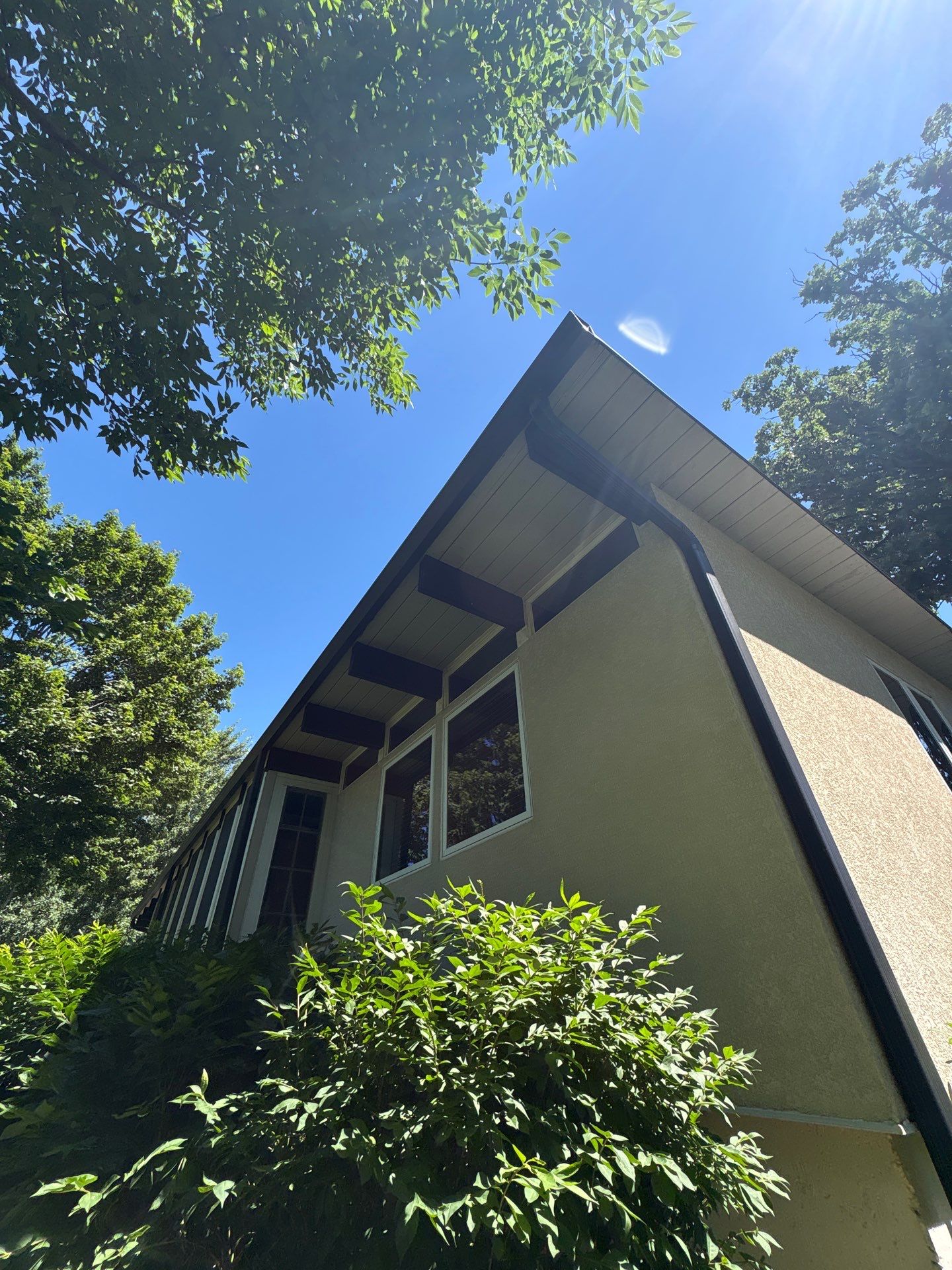 Exterior Trim Painting and Rafter Staining in Sioux Falls by Select Painting, Coatings & Garage Cabinets