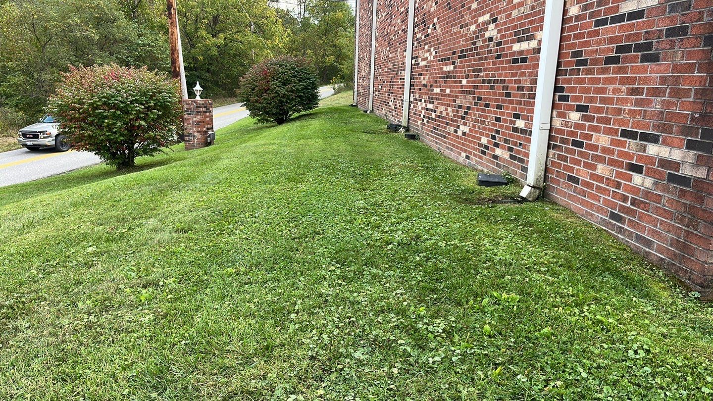 Lawn Mowing using Lawn mower by GrassBusters, Inc.