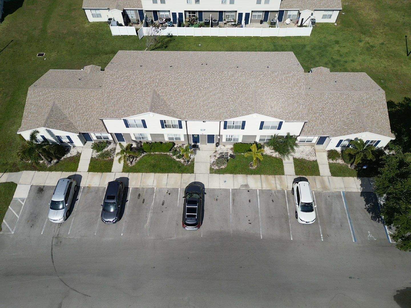 Apartment Complex Shingle Roof Replacement by Sailfish Roofing