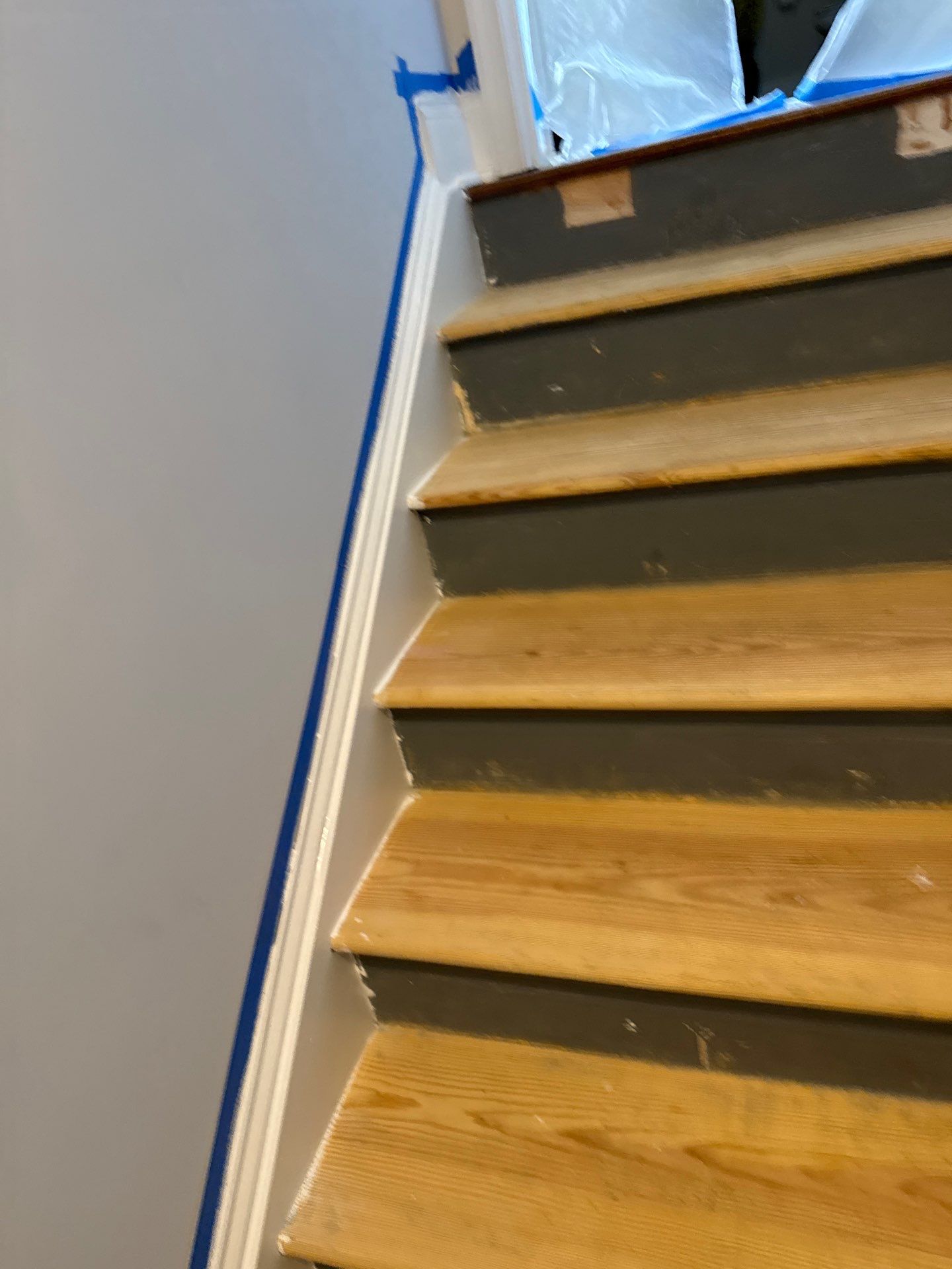Stairway Installation using t vinyl stair tread and reversibleriser by La Bendicion Contruction Llc