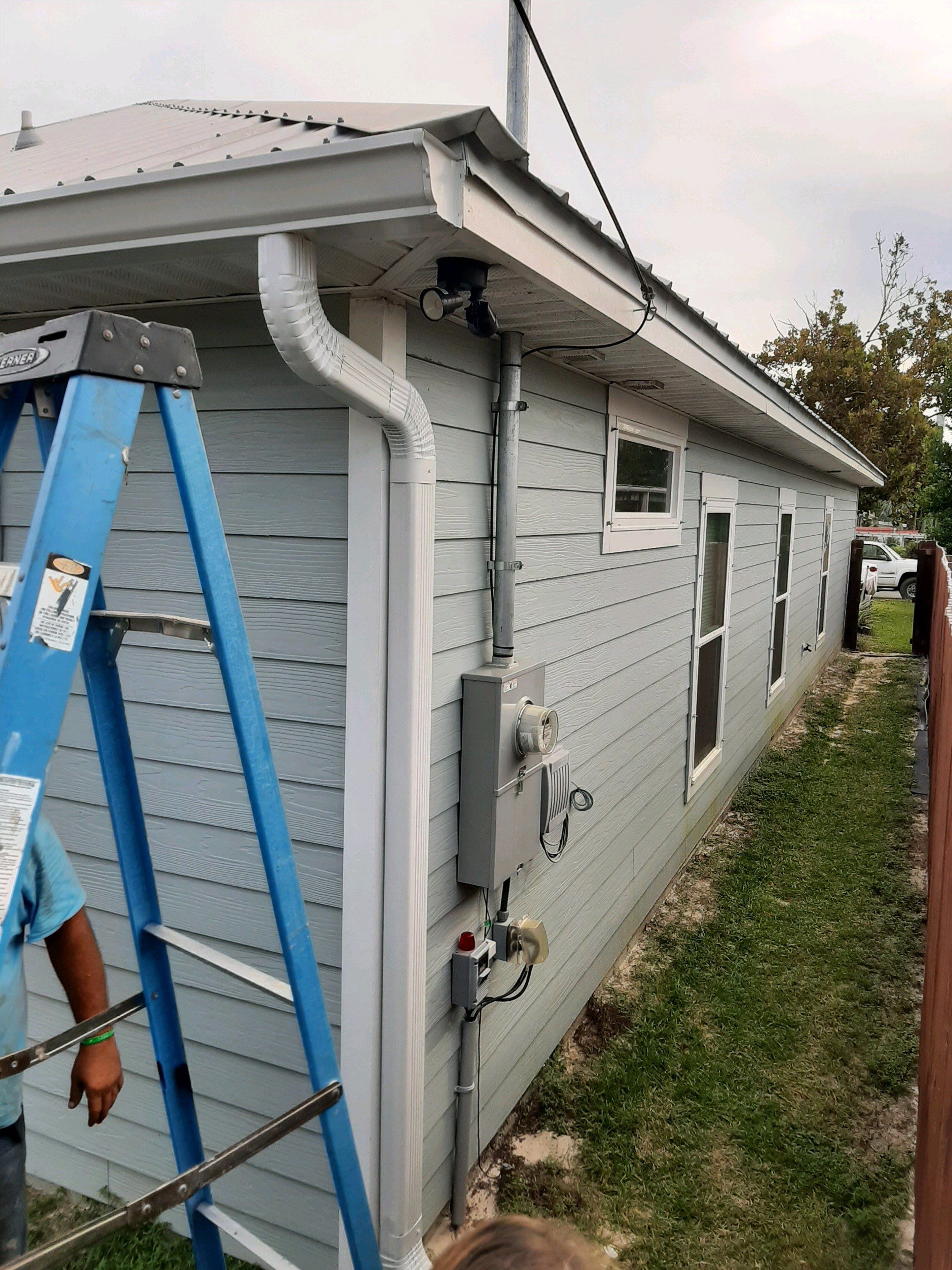 Seamless Gutter Installation using White K-Style Gutters by Gutter Professors