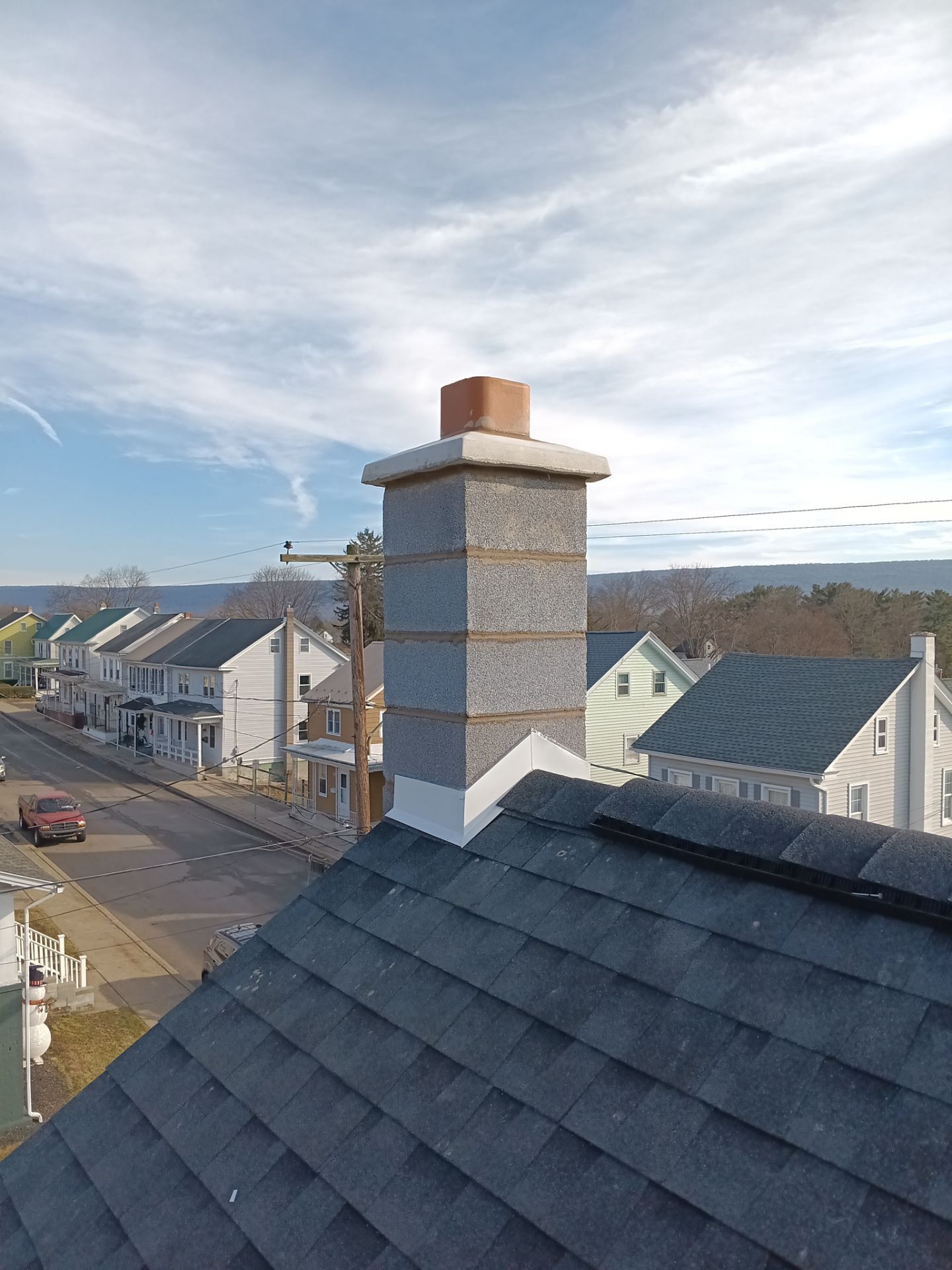 Shingle Roof Installation and New Masonry Chimney in Tower City by Esh Builders