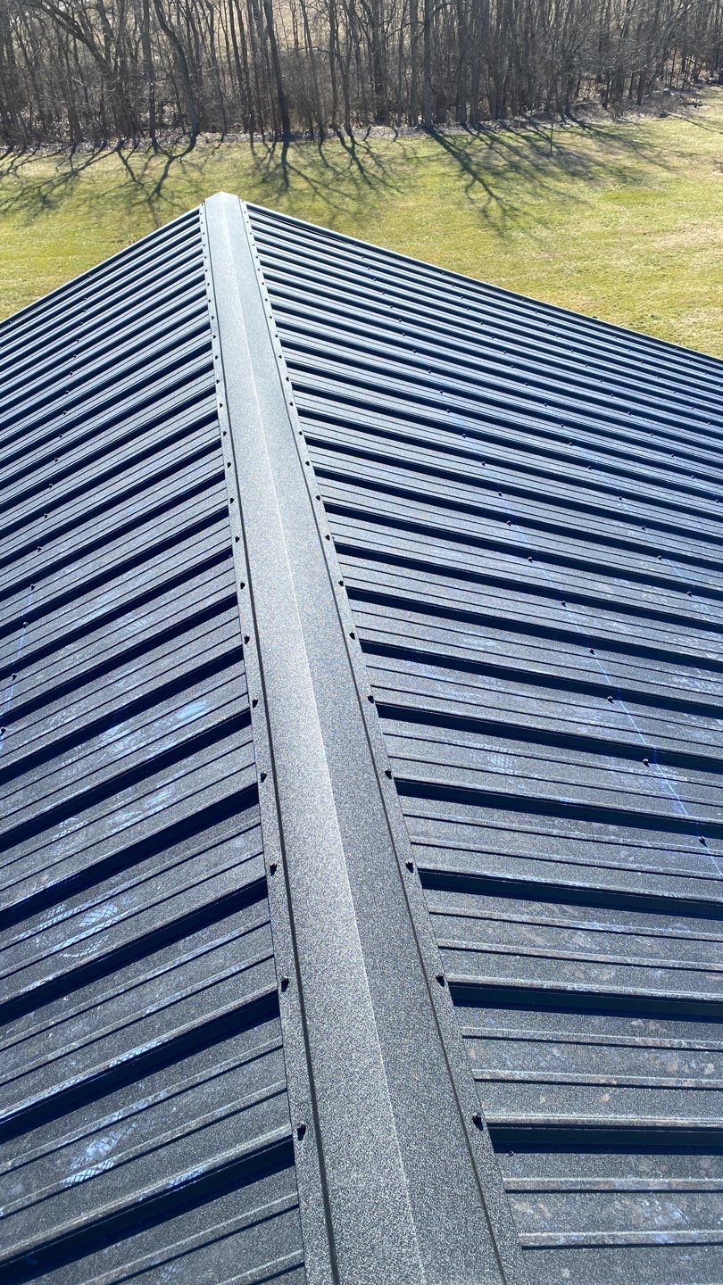 Residential Roofing Installation using Performance Panel Metal - Frost Black by RoofX 