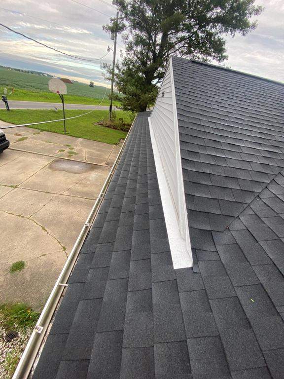 Storm damage roof replacement by Nitro Roofing and Construction