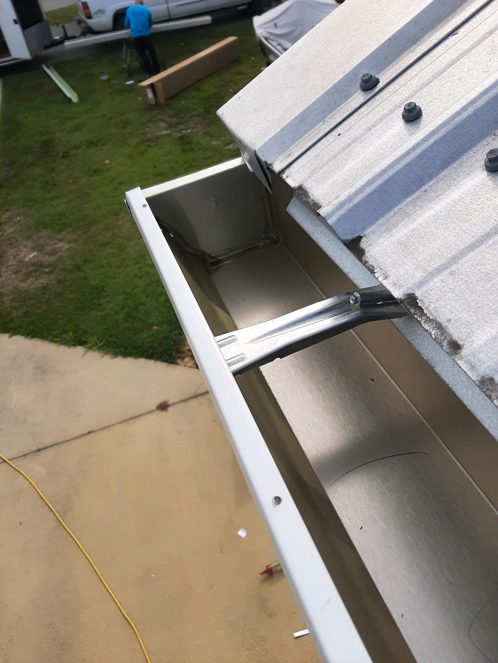 Seamless Gutter Installation using White K-Style Gutters by Gutter Professors