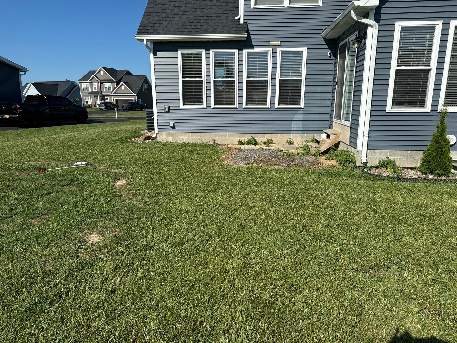 Majestic Ashlar stamped concrete patio with rock face steps  by NG Masonry & Construction LLC