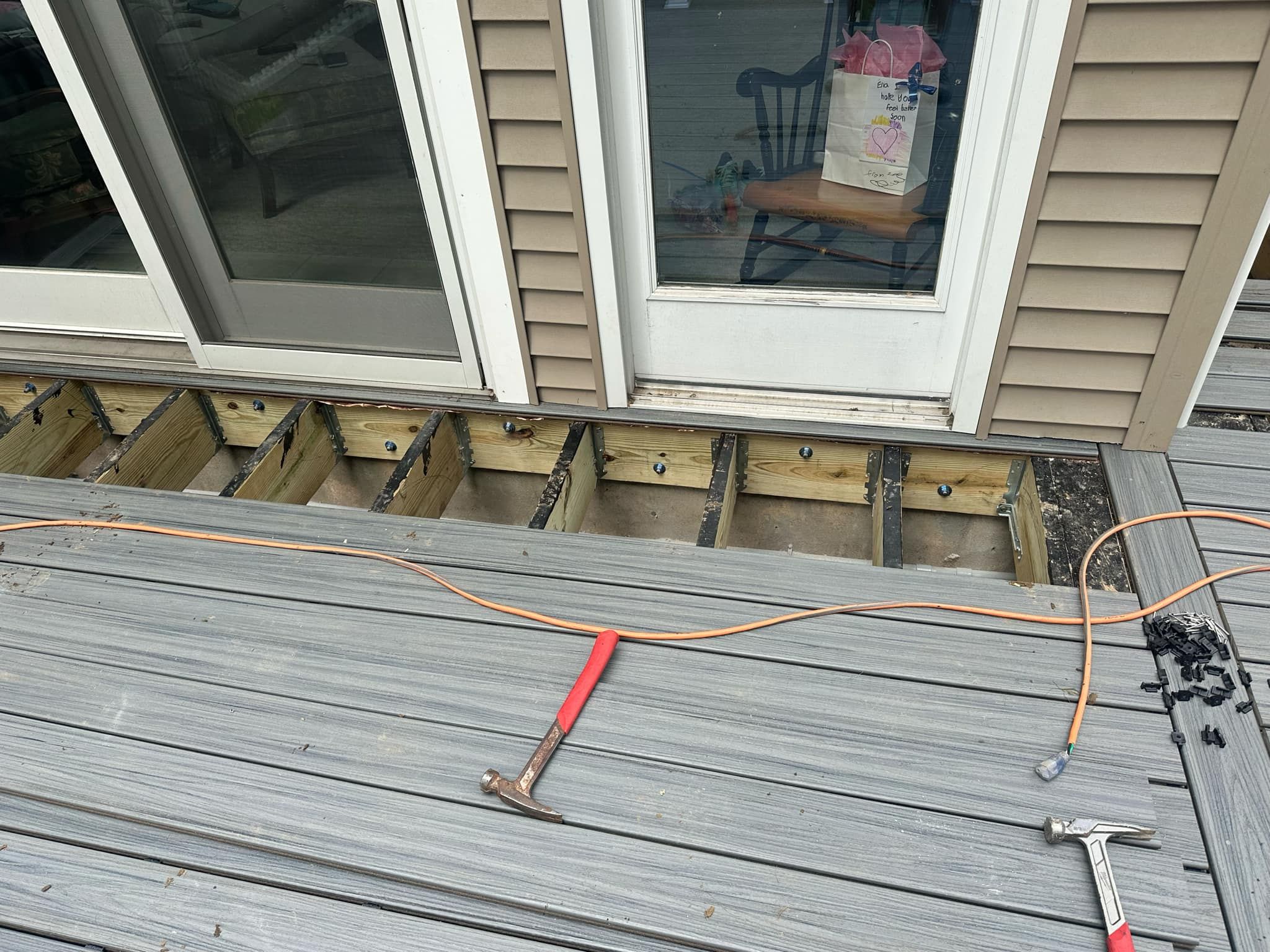 Deck Replacement with Trex Tropical Island Mist , matching cocktail rail and lattice bottom by DiGiorgi Roofing and Siding Inc