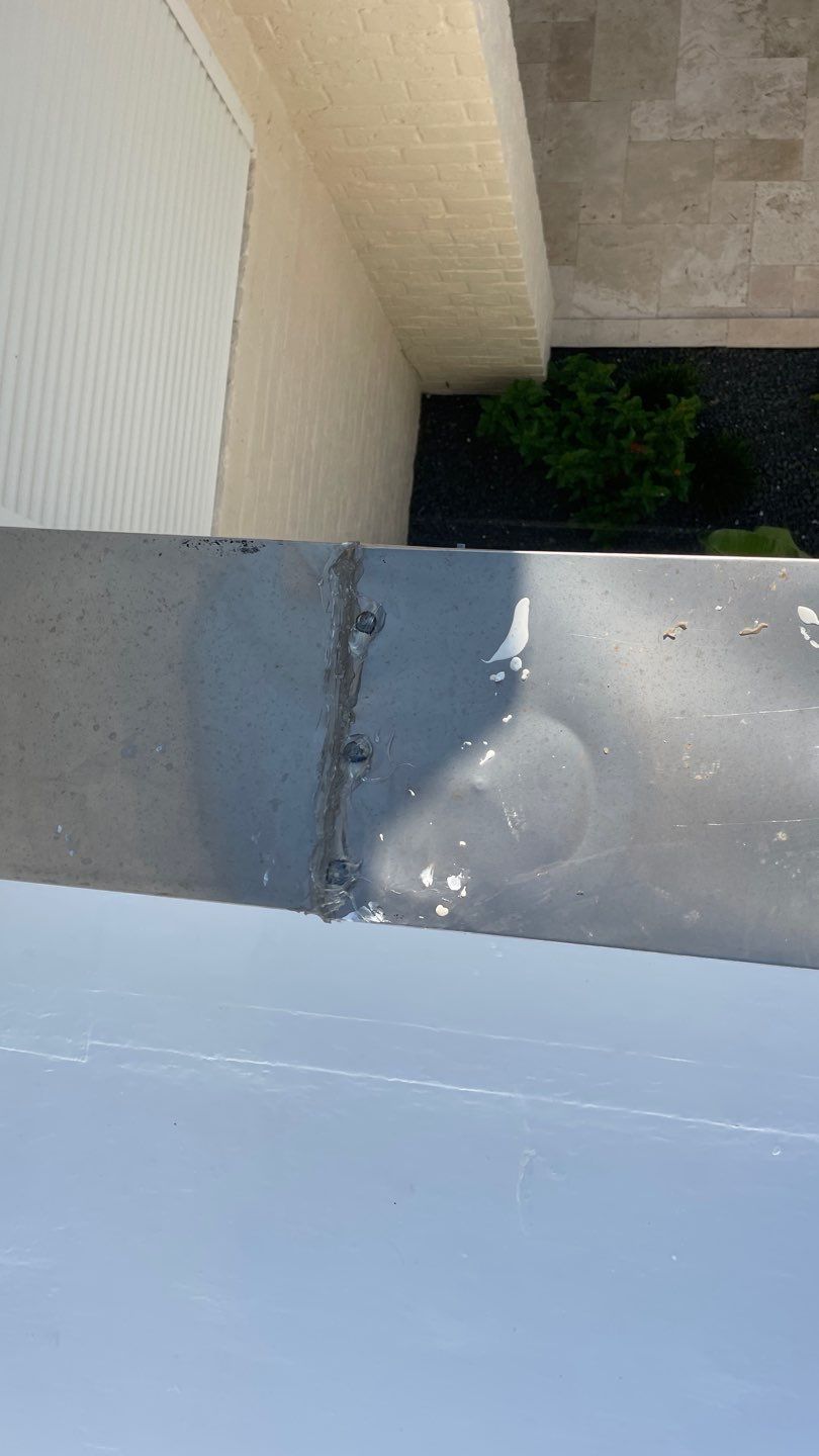 Off with the Tile and on with the TILCOR stone coated metal.  by Bayfront Roofing and Construction