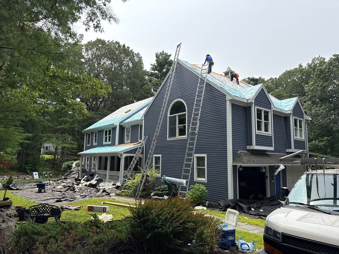 Solar-Ready Roof Replacement with GAF Pewter Gray Shingles & VELUX Skylights by Sensible Home Solutions