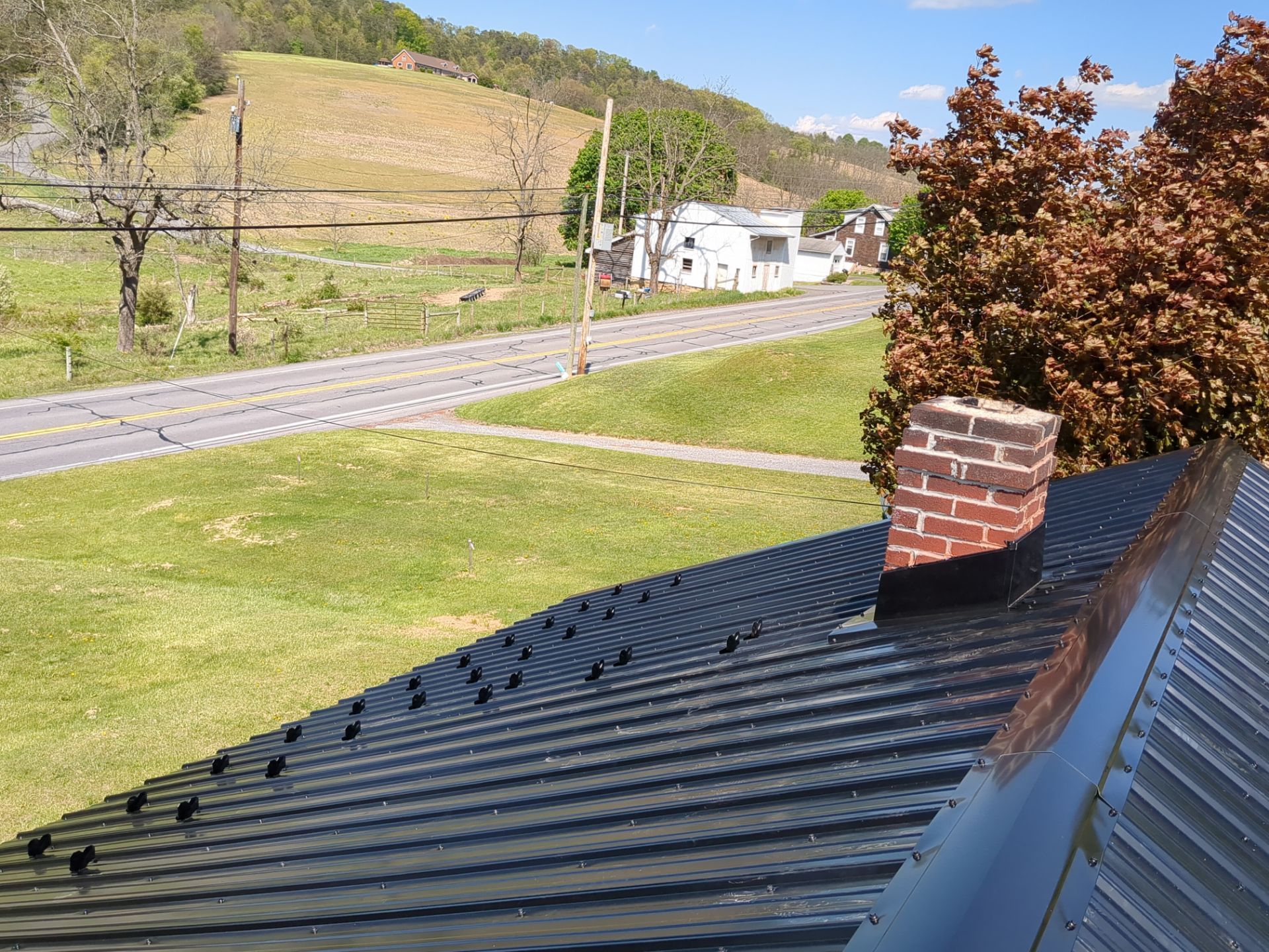 Black ABM Metal Roof Replacement  by Esh Builders