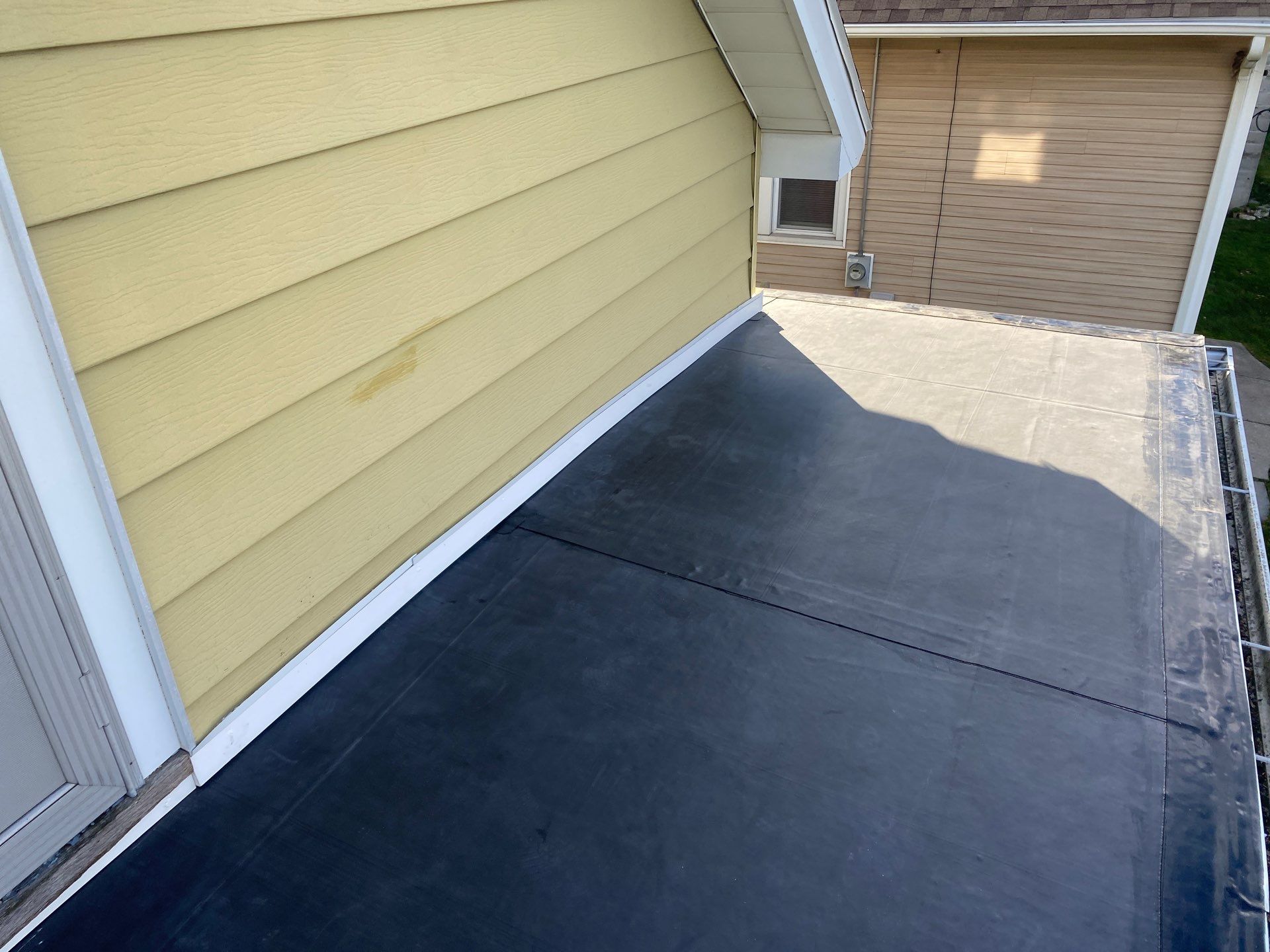Flat Roof Porch with 60mil EPDM Rubber by Gellings Roofing & Siding