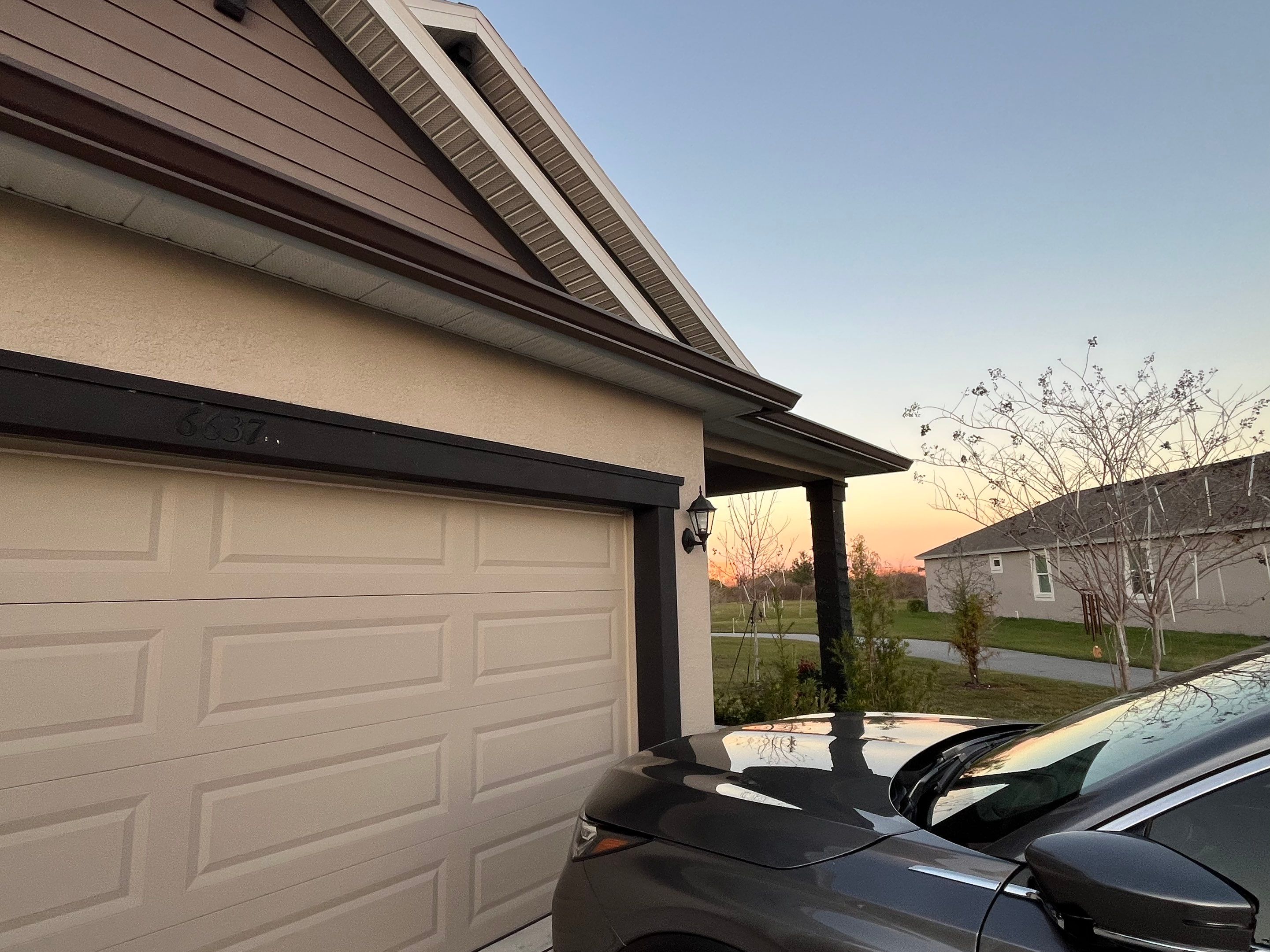 3X4 elbow Downspouts using Musket Brown Seamless Gutters in Lakeland FL by Gutter Professors