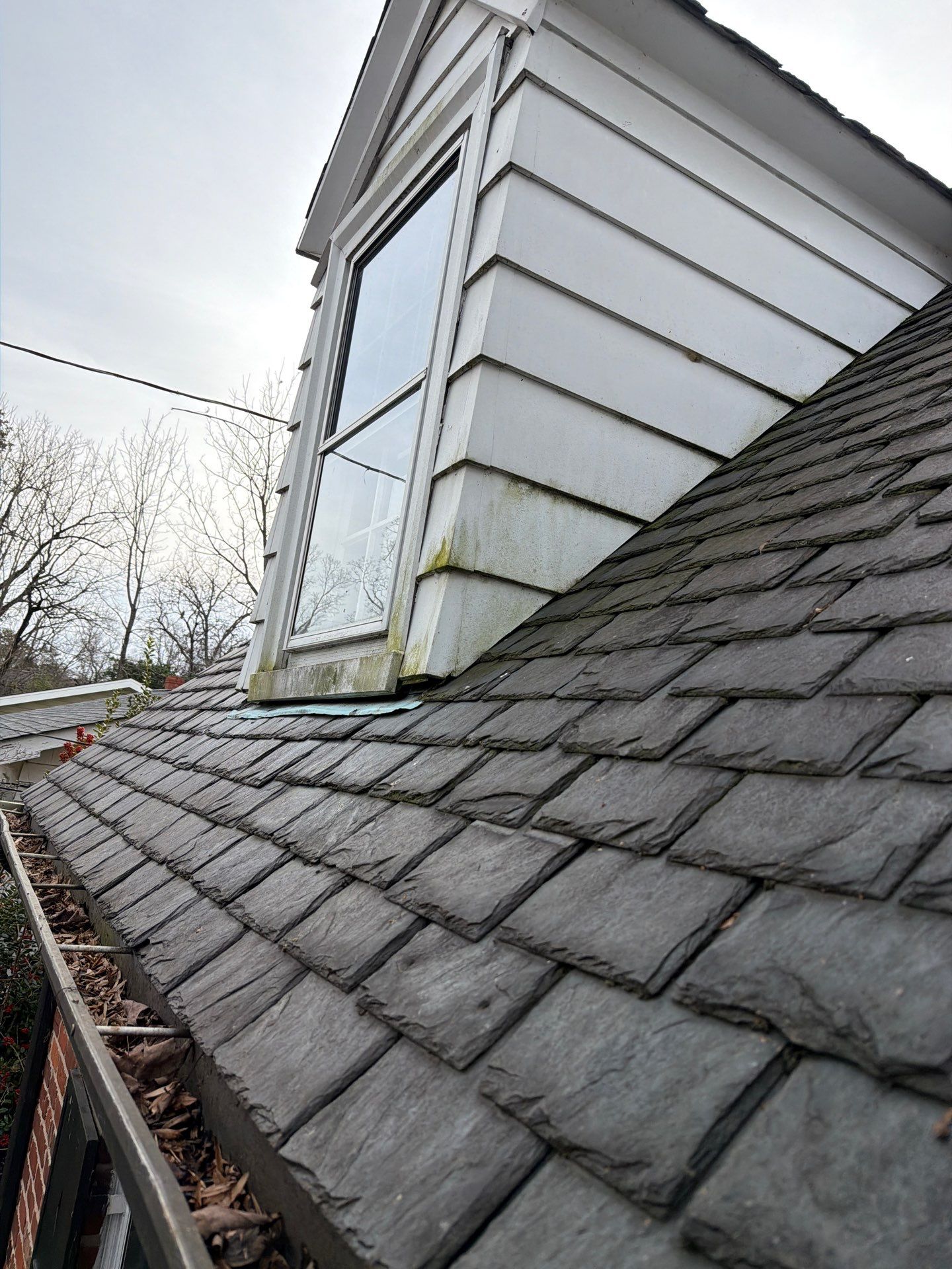 Slate Roof Restoration and Copper Ridge Cap Install in Richmond by Cade Construction