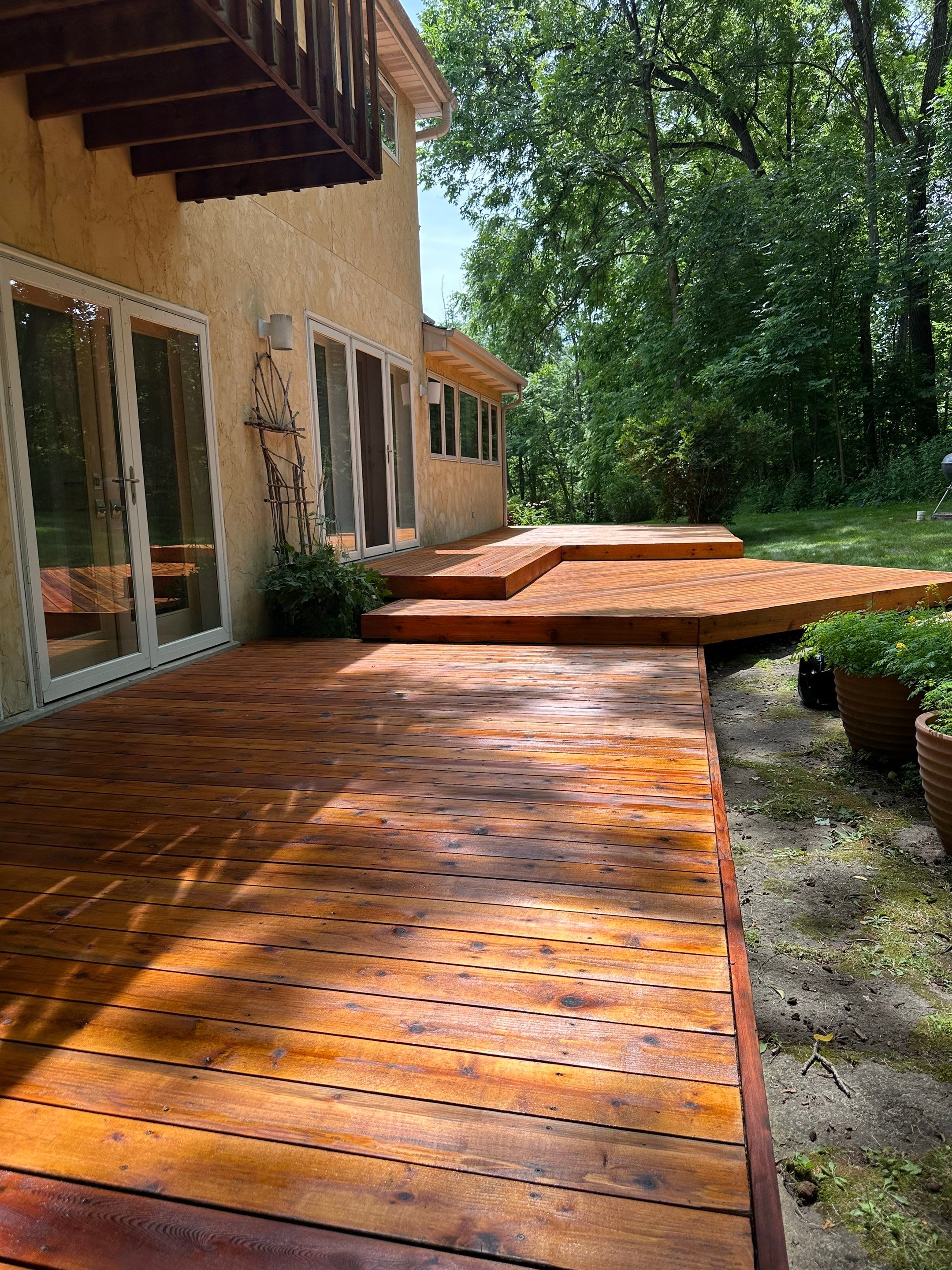 Multi-Level Wood Deck Restoration and Refinishing in Muskego by OCS Contracting Services
