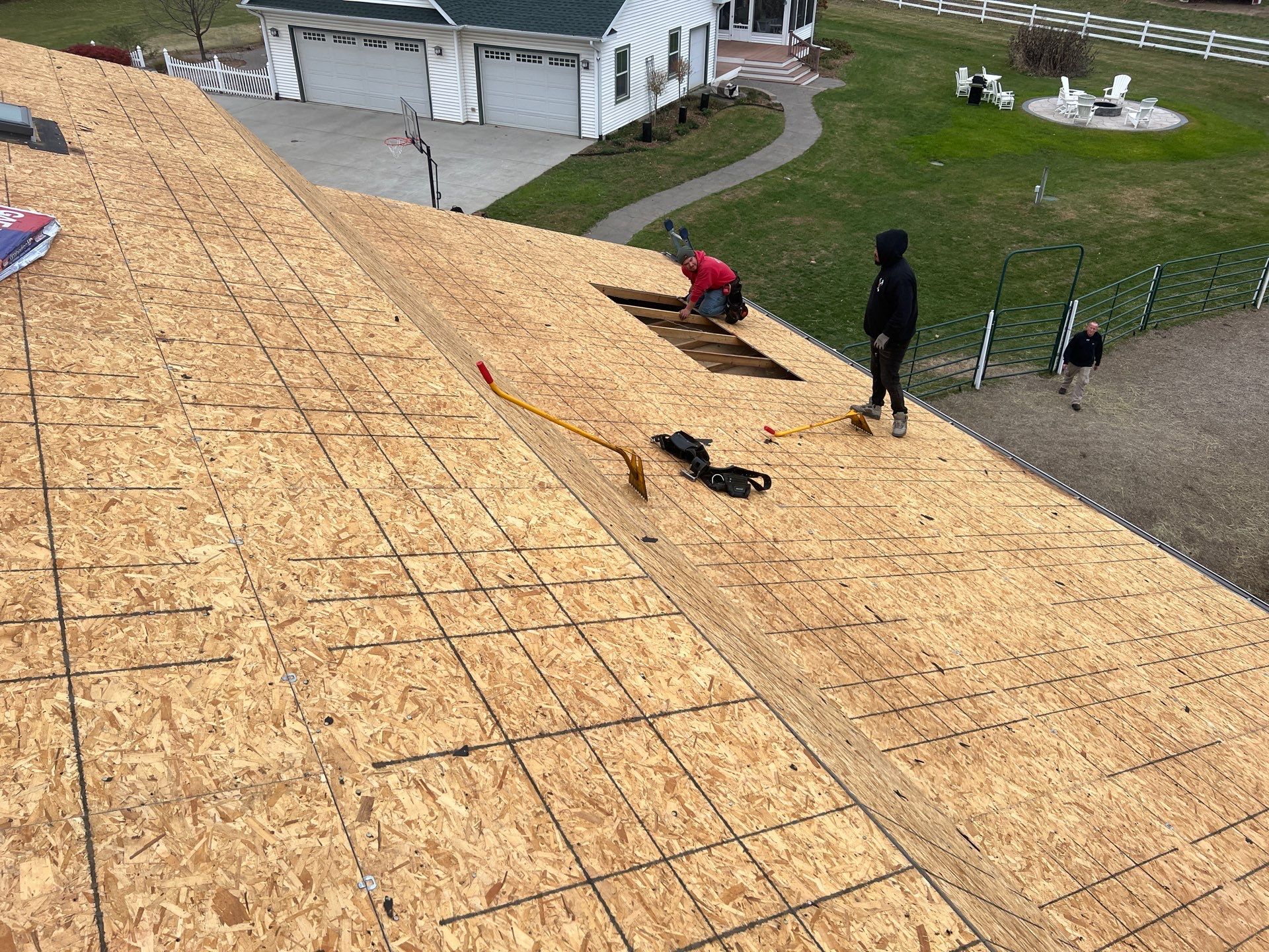 Residential Roofing Replacement with Multiple Skylights in Mason, Michigan by Acme Exteriors