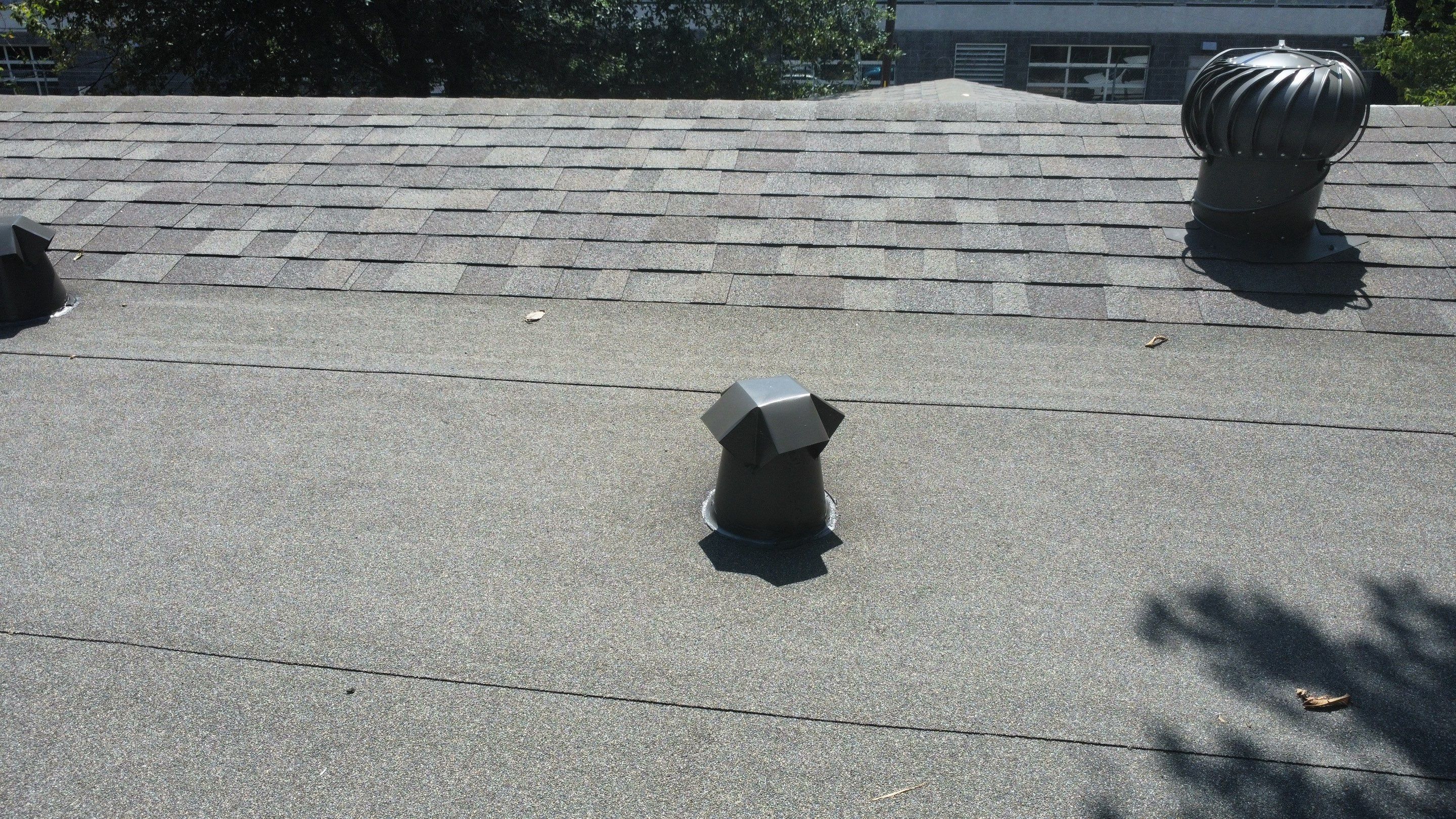 Mixed Roof System ā Oakridge Driftwood + Flat Roof Section | Austin, TX by Kstylez Roofing & Construction