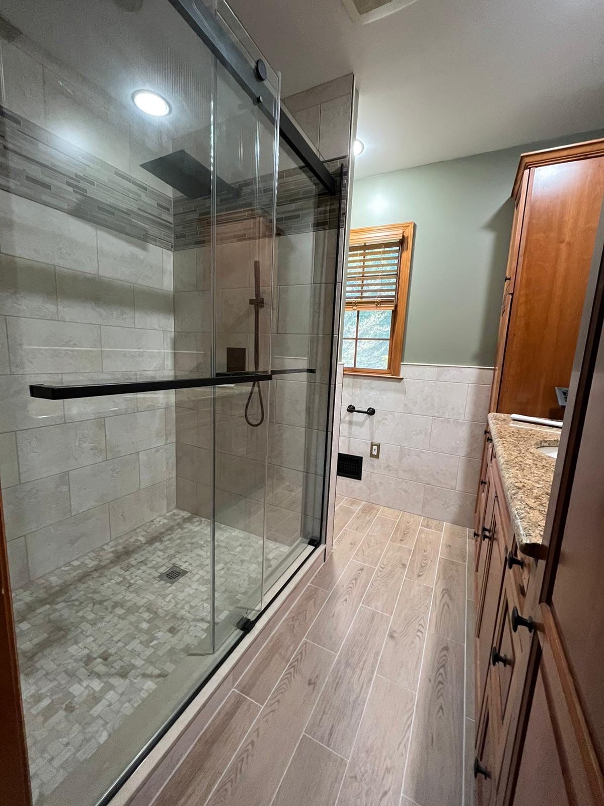 Bathroom Remodel using Tile by Home Concepts Construction