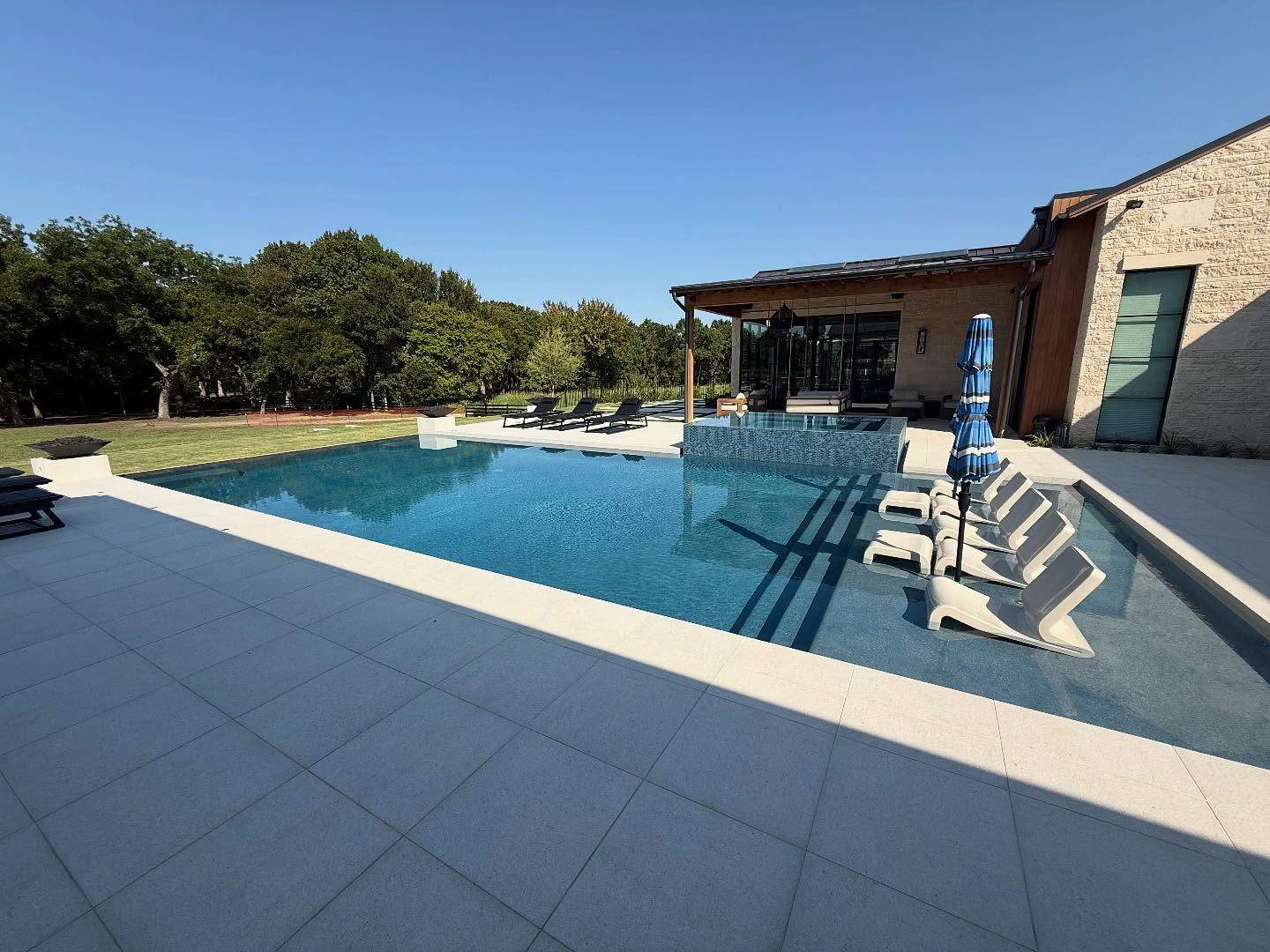 Jumbo Double Pool with Negative Edge by Pinnacle Pools and Spas - DFW