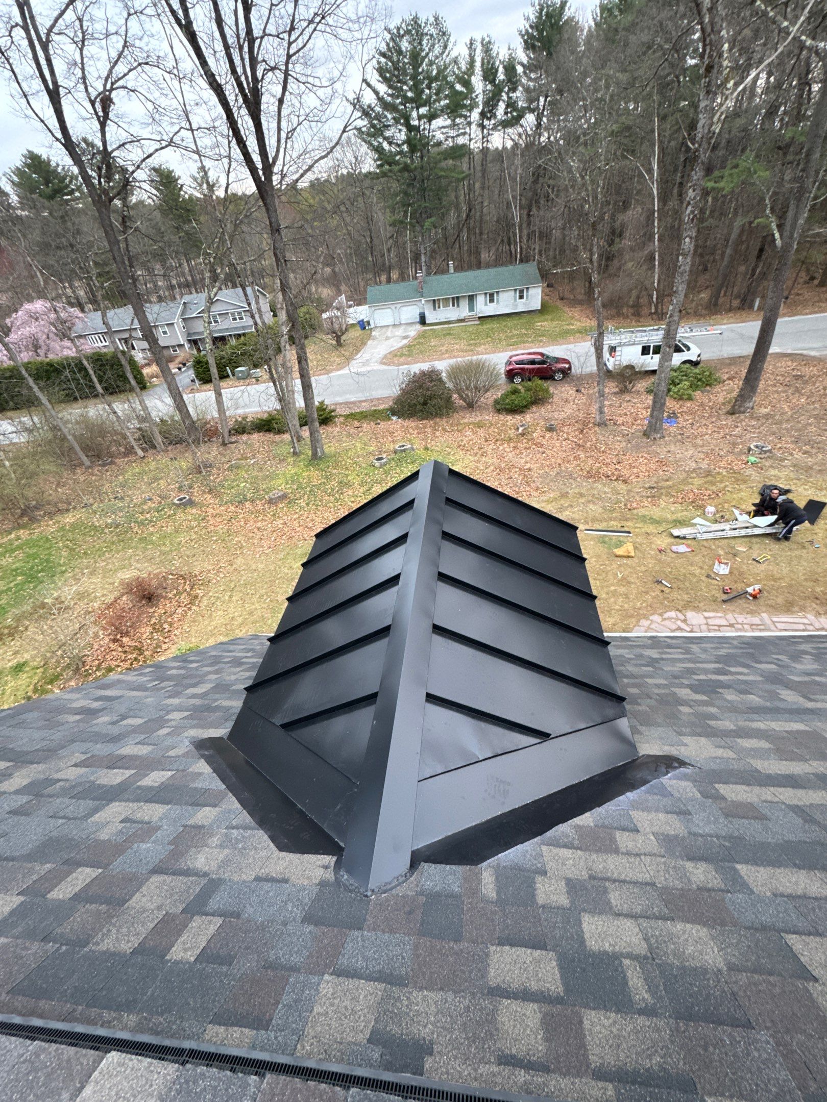 Roof Replacement in Londonderry, NH with Full Re-Decking, Spray Foam Prep & Black Sable Shingles by Compass exteriors