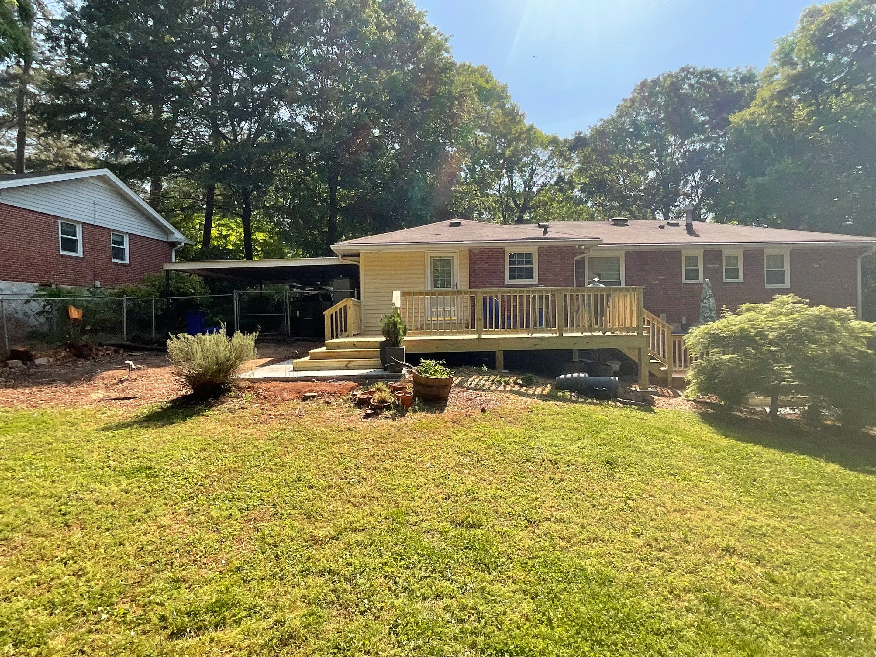 Custom Pressure-Treated Wood Deck and Railing Installation in Decatur by Swift Home Renovations