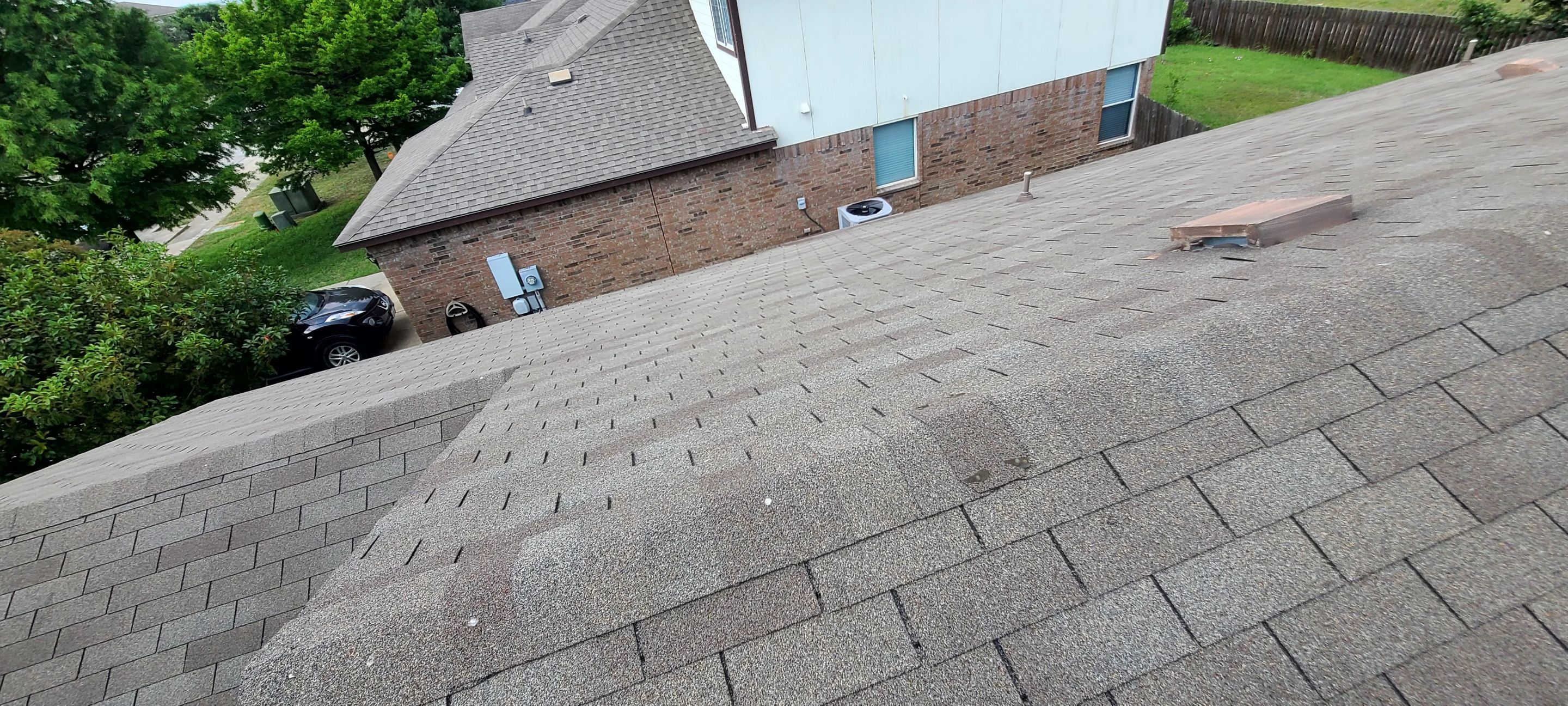 Asphalt Shingle Roof Replacement and Window Glazing in Manor by Caliber Restoration LLC