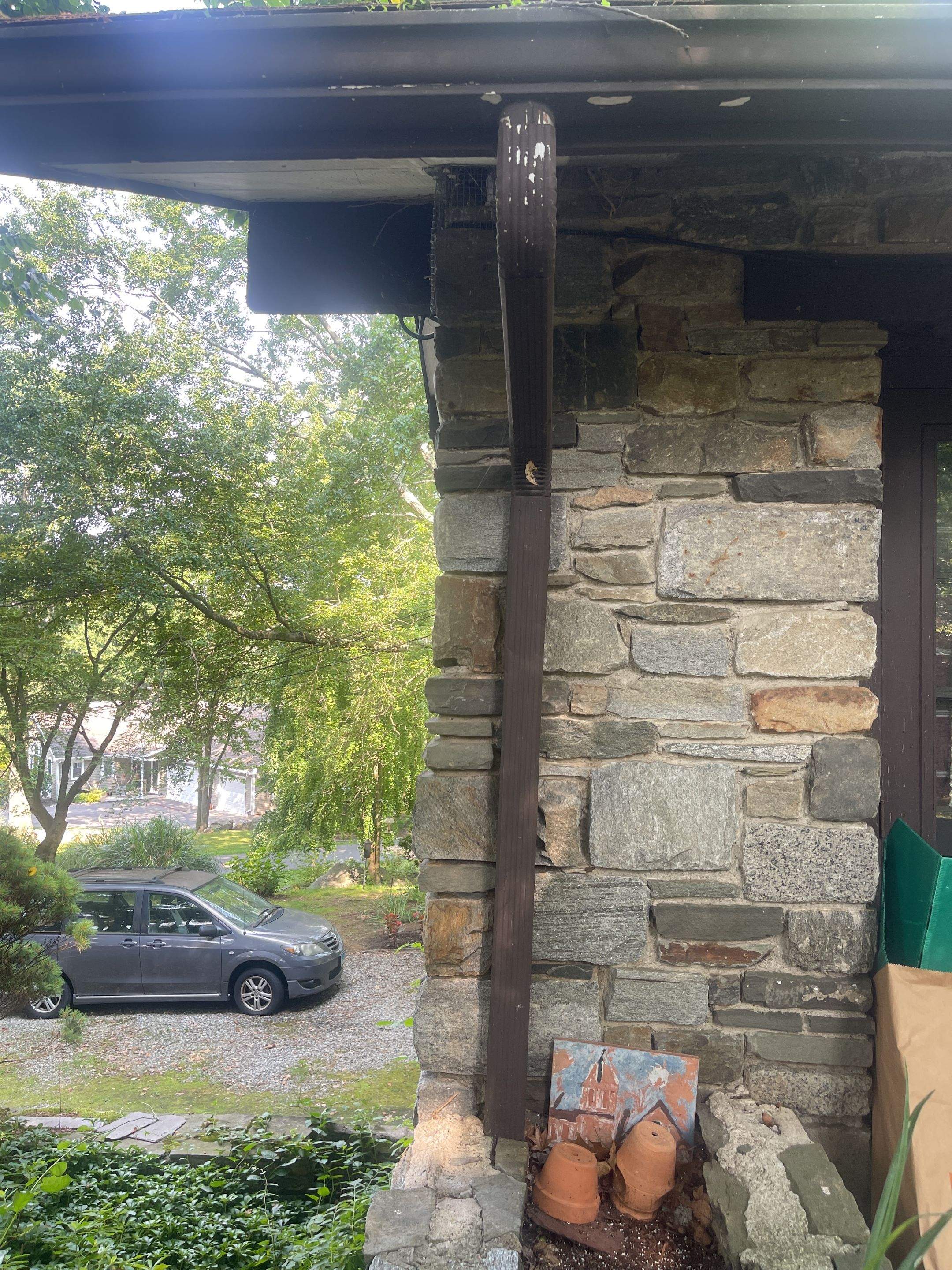 Gutter Installation using 5k Brown Gutters by A Plus Exterior