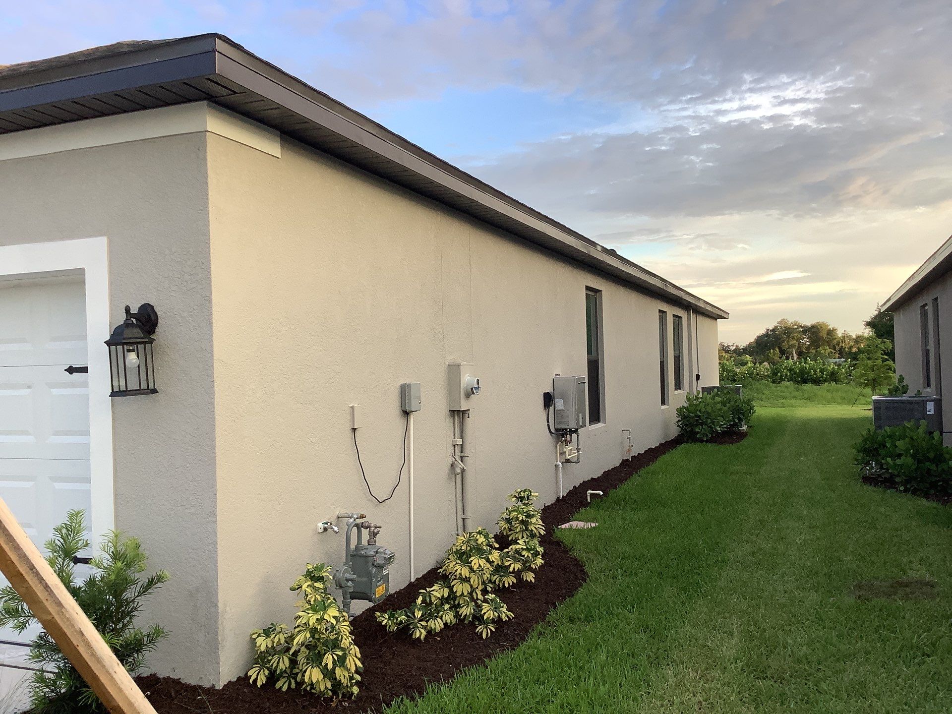 Musket Brown Seamless Gutters using Musket Brown Seamless Gutters in Nokomis FL by Gutter Professors