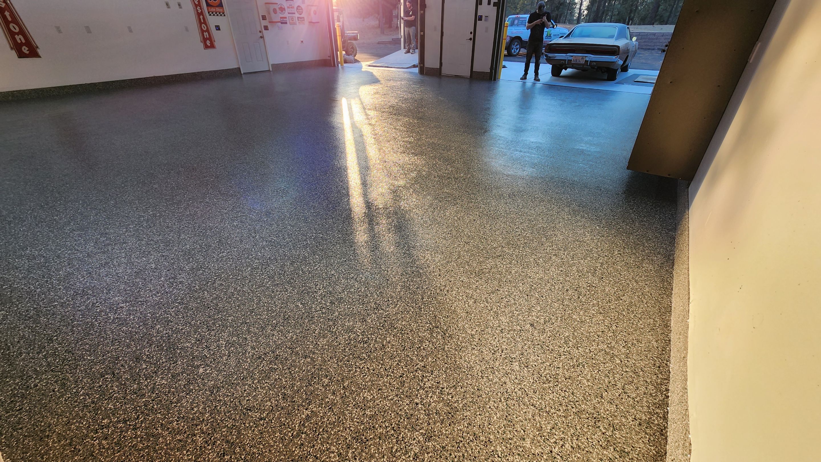 Garage Transformation using Domino with Blue by Croc Coatings, LLC