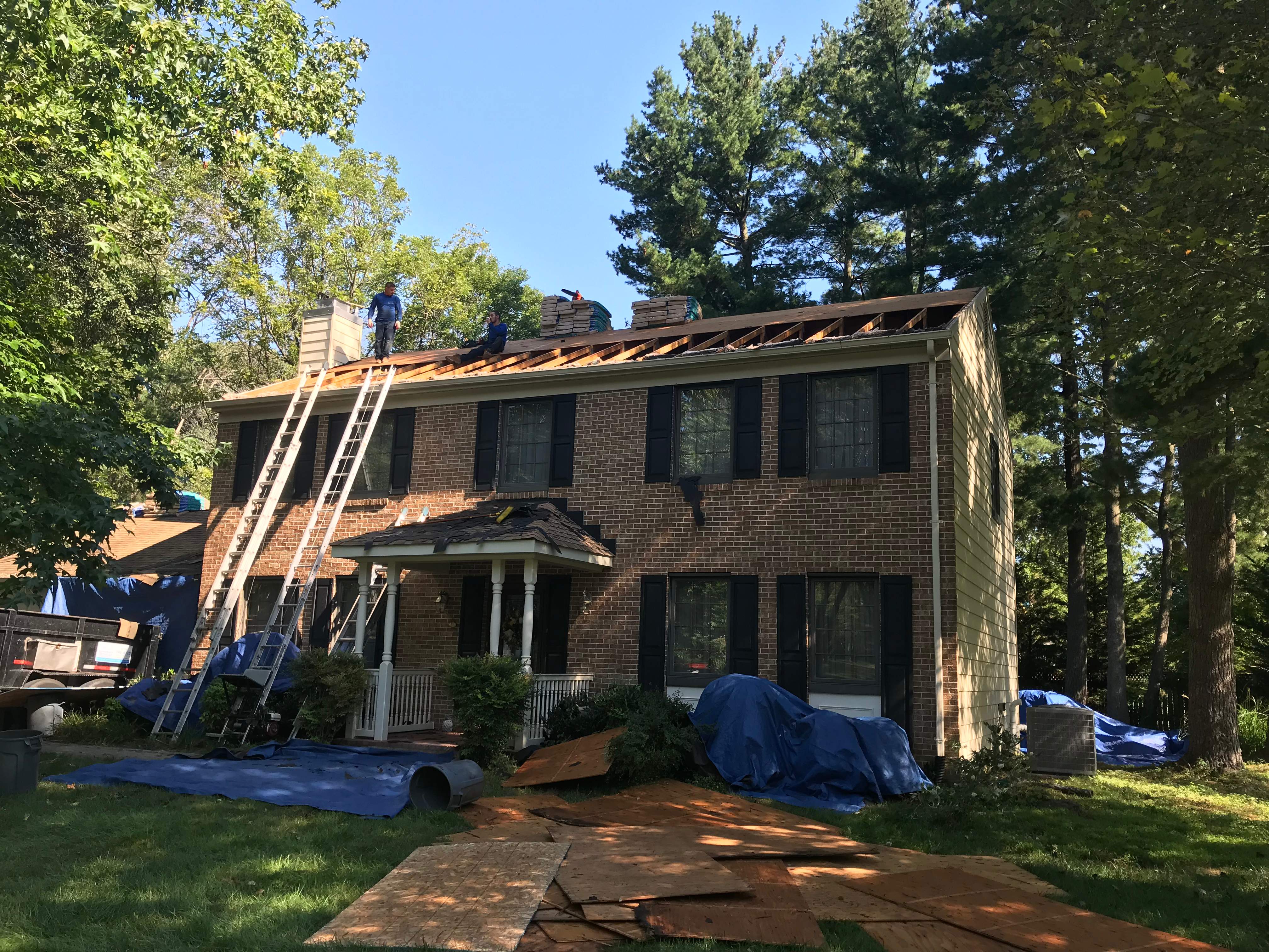 Residential Roofing Installation using Landmark Shingles Color Weatherwood by Alpha Design Services