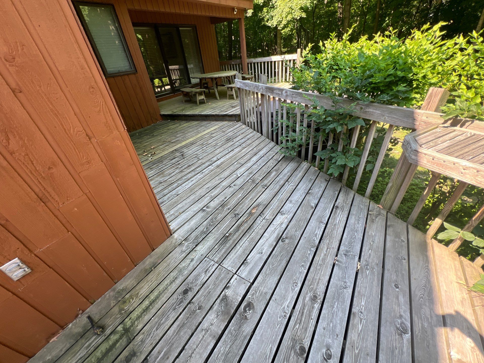 Deck, Patio, and Tennis Court Cleaning by Northern Power Washing LLC.