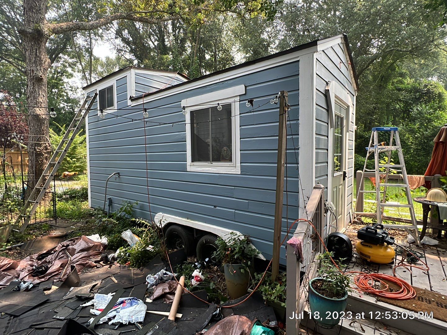 tiny home remodel- siding,paint,roofing by Nailed It Roofing & Remodeling LLC