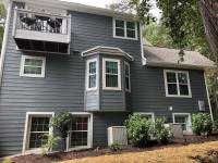 Siding Installation using JH Batten Smooth and JH Cedarmill Plank STMT by ExteriorPros
