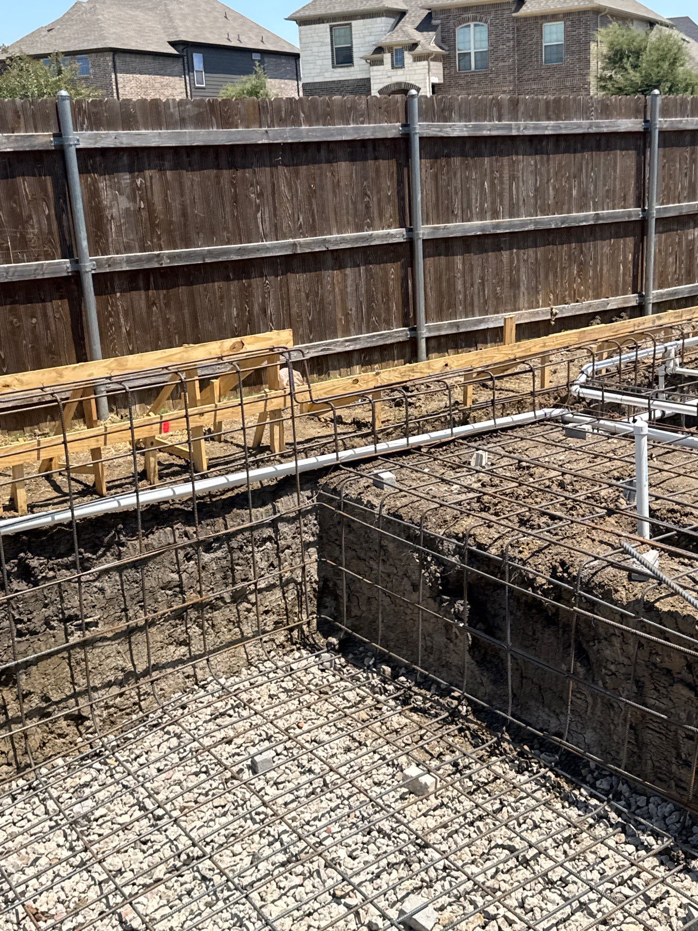 Geometric Pool with Tanning Ledge by Pinnacle Pools and Spas - DFW