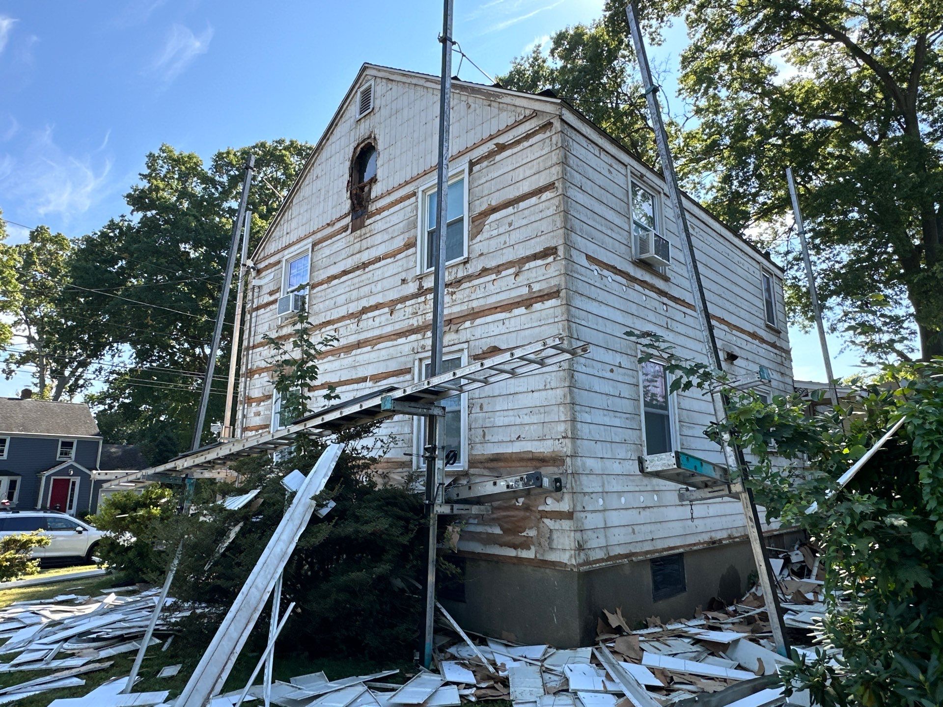 Siding Installation using CertainTeed Monogram Vinyl Siding - D4 - Forest by A Plus Exterior