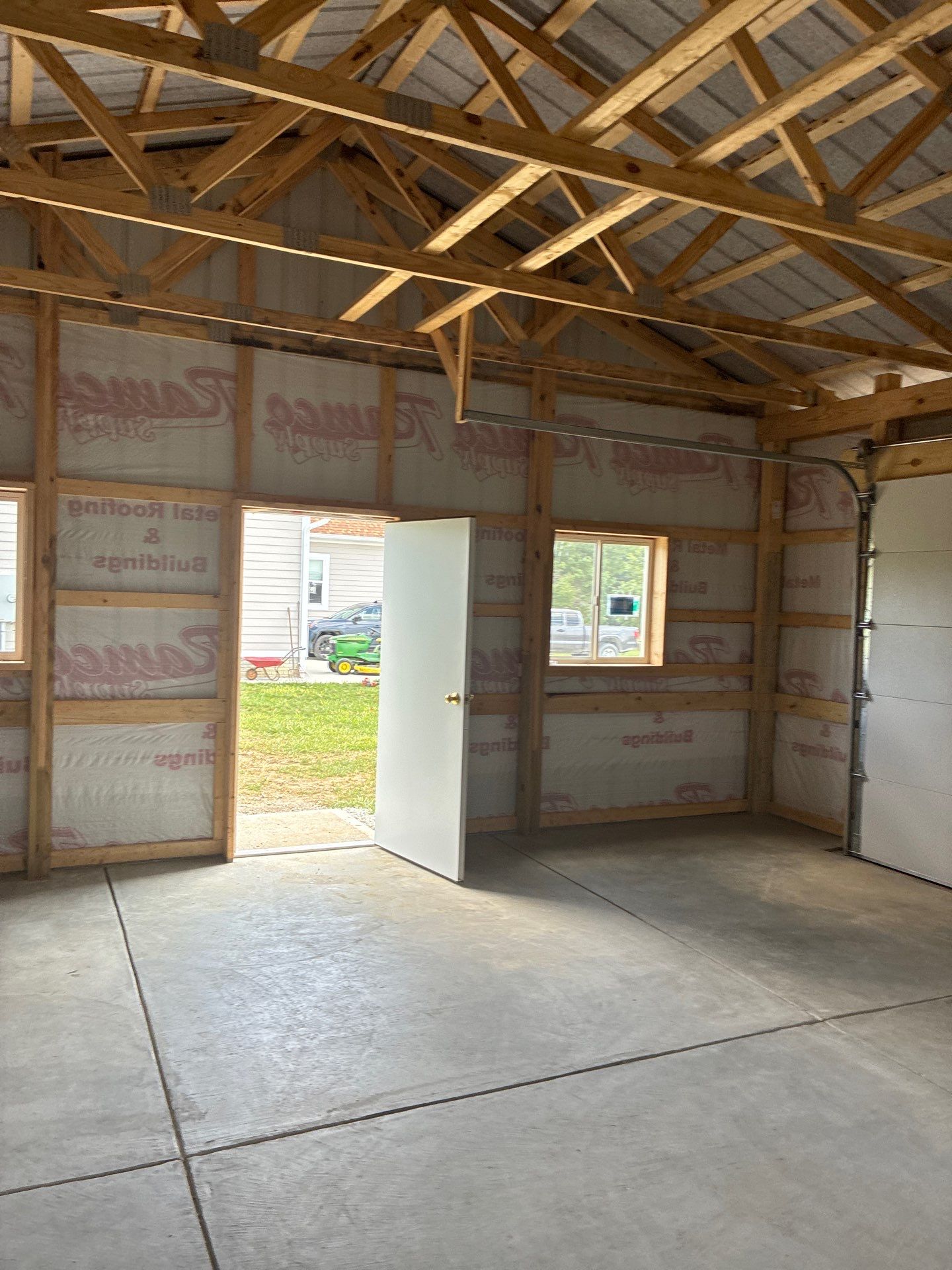 Custom Post-Frame Pole Barn with Concrete Floor in Greenfield by The Barn Builders