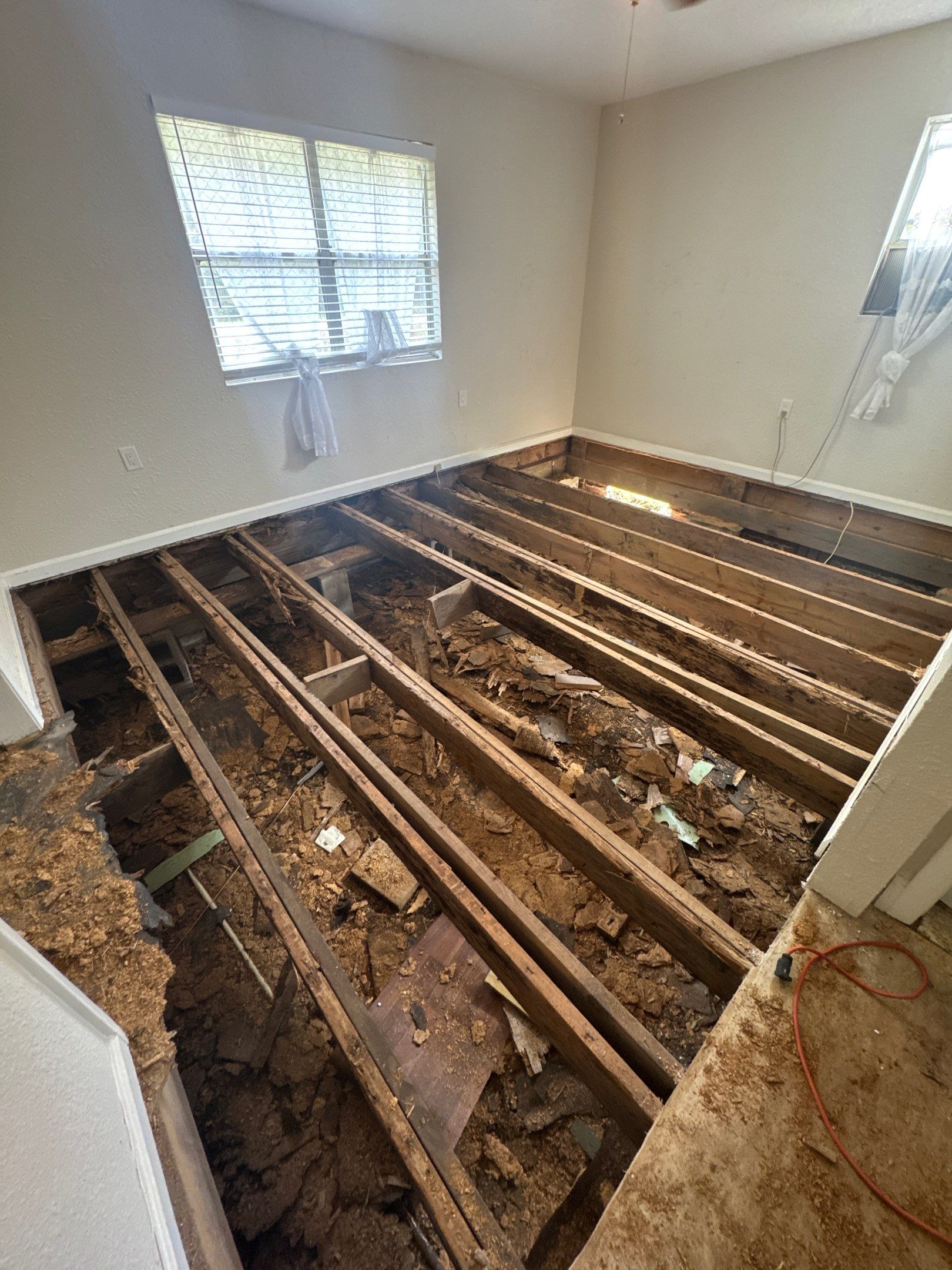 Subfloor Repairs & Flooring Installation by Axtra Hand