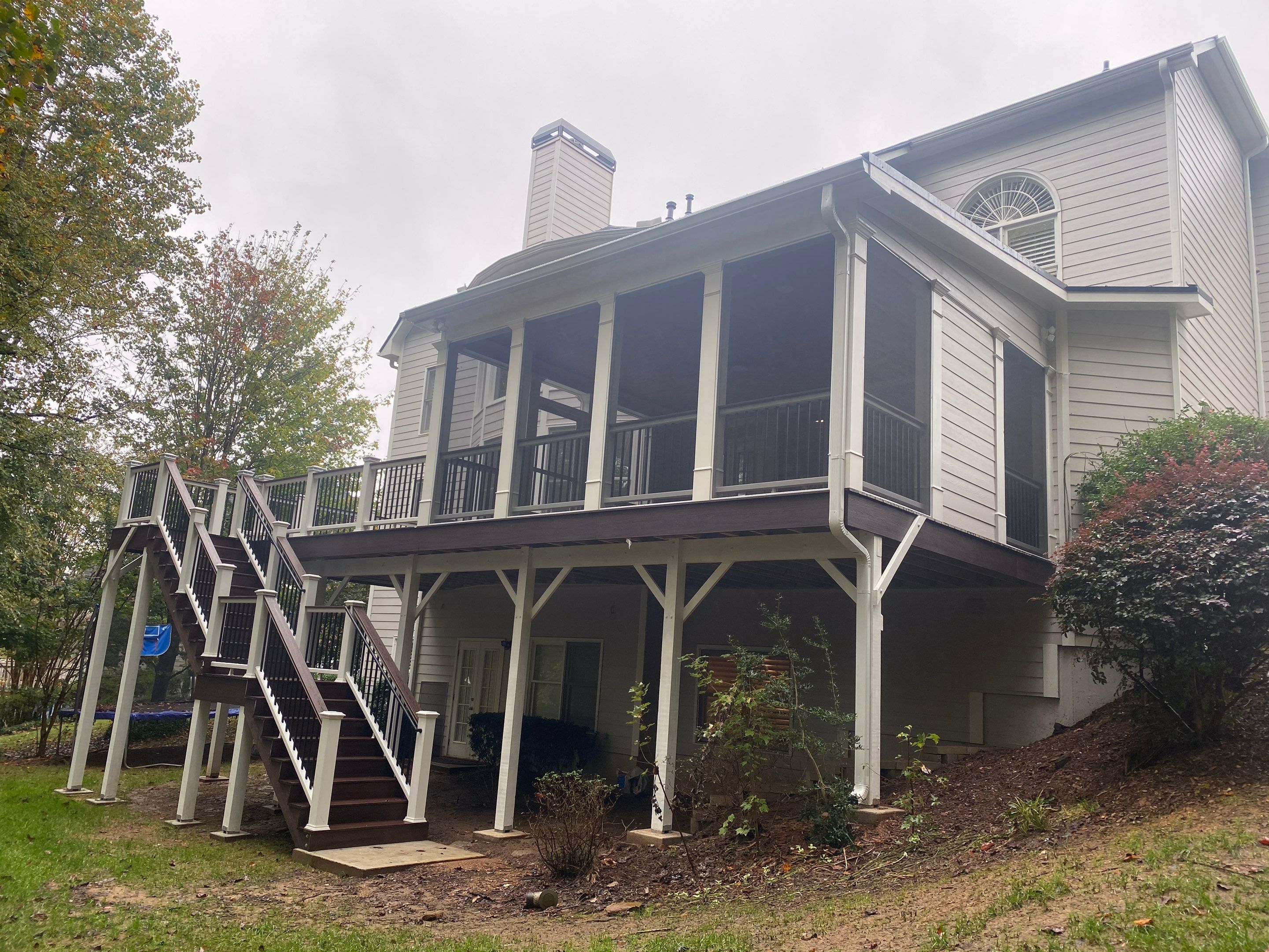 Elevated Screened-in Porch and Composite Deck Construction in Mableton by Swift Home Renovations