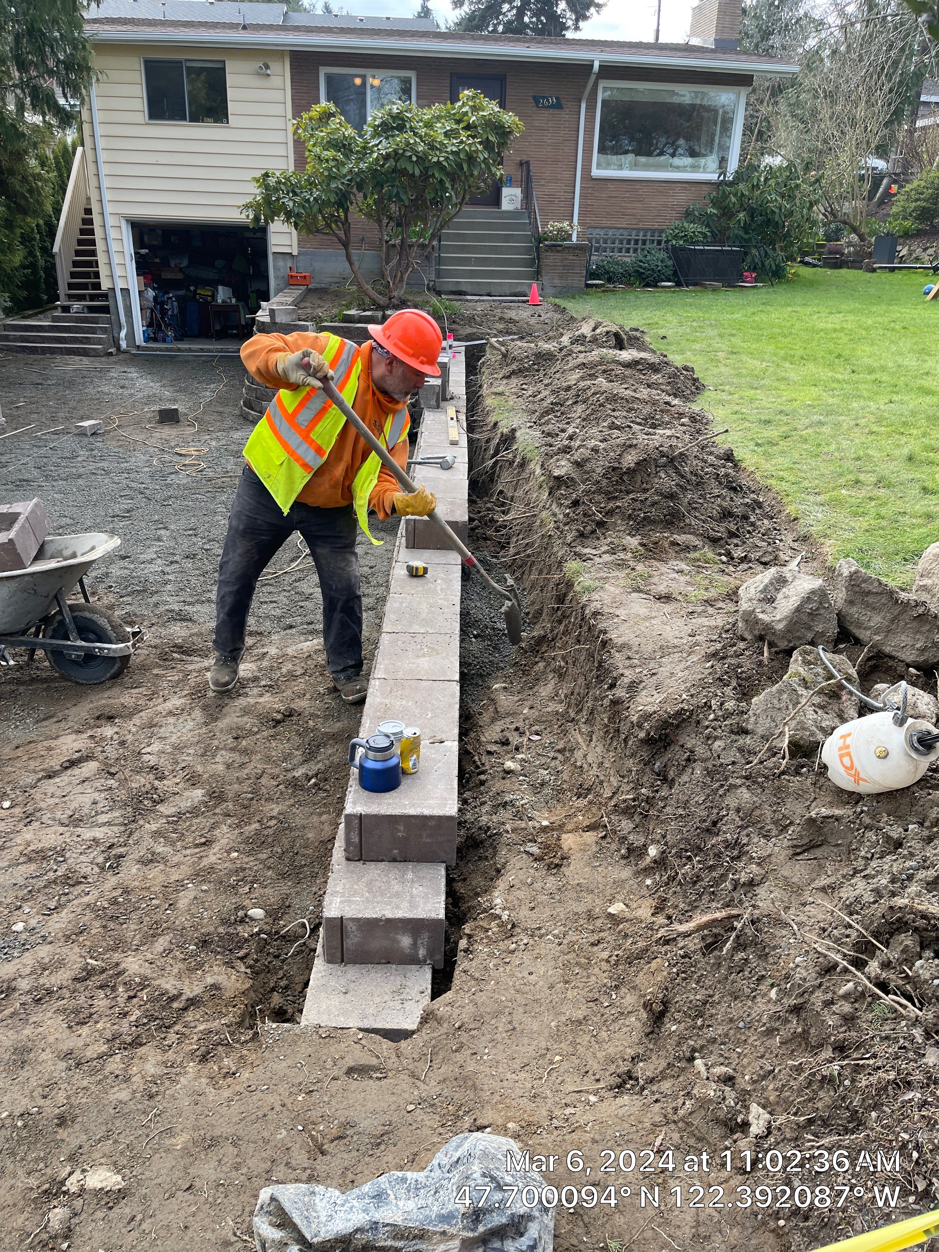 Lorra | Asphalt Driveway Repair & Retaining Wall by Jireh Asphalt & Concrete Inc 