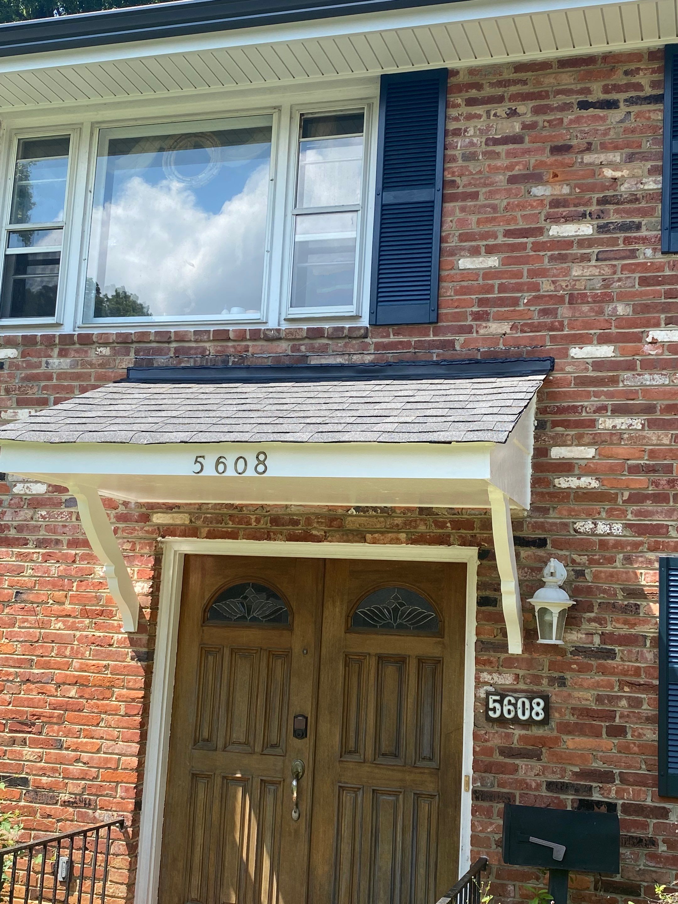 Springfield Tree Damage Restoration: CertainTeed Landmark Designer Shingles in Charcoal Black by RM Banning, Inc.